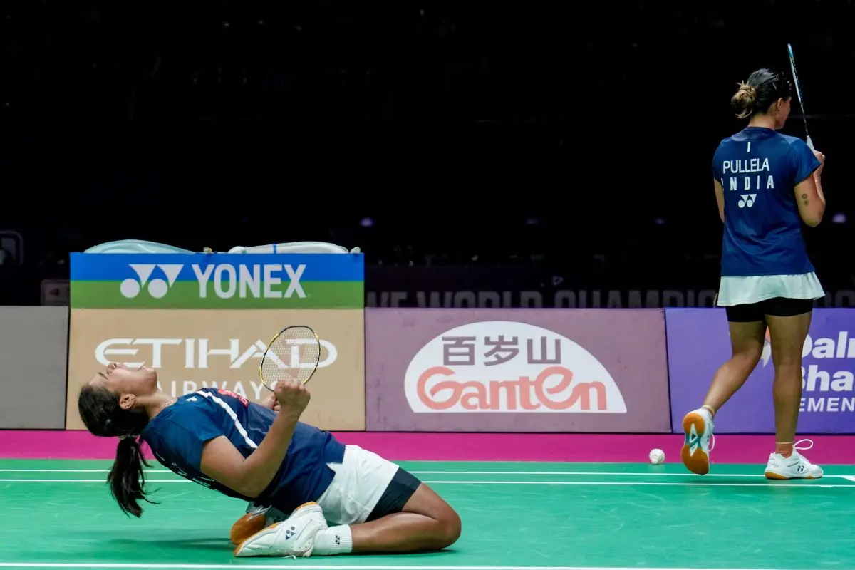 India's Treesa Jolly, left, and Gayatri Gopichand Pullela celebrate after winning against China's Jia Yi Fan and Zhang Shu Xian, unseen, during the womens doubles Quarter-final round at the BWF World Championships, at IGI Stadium in New Delhi. | Photo: PTI