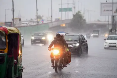 Delhi-NCR wakes up to rain; waterlogging reported as IMD issues heavy rain alert | WATCH