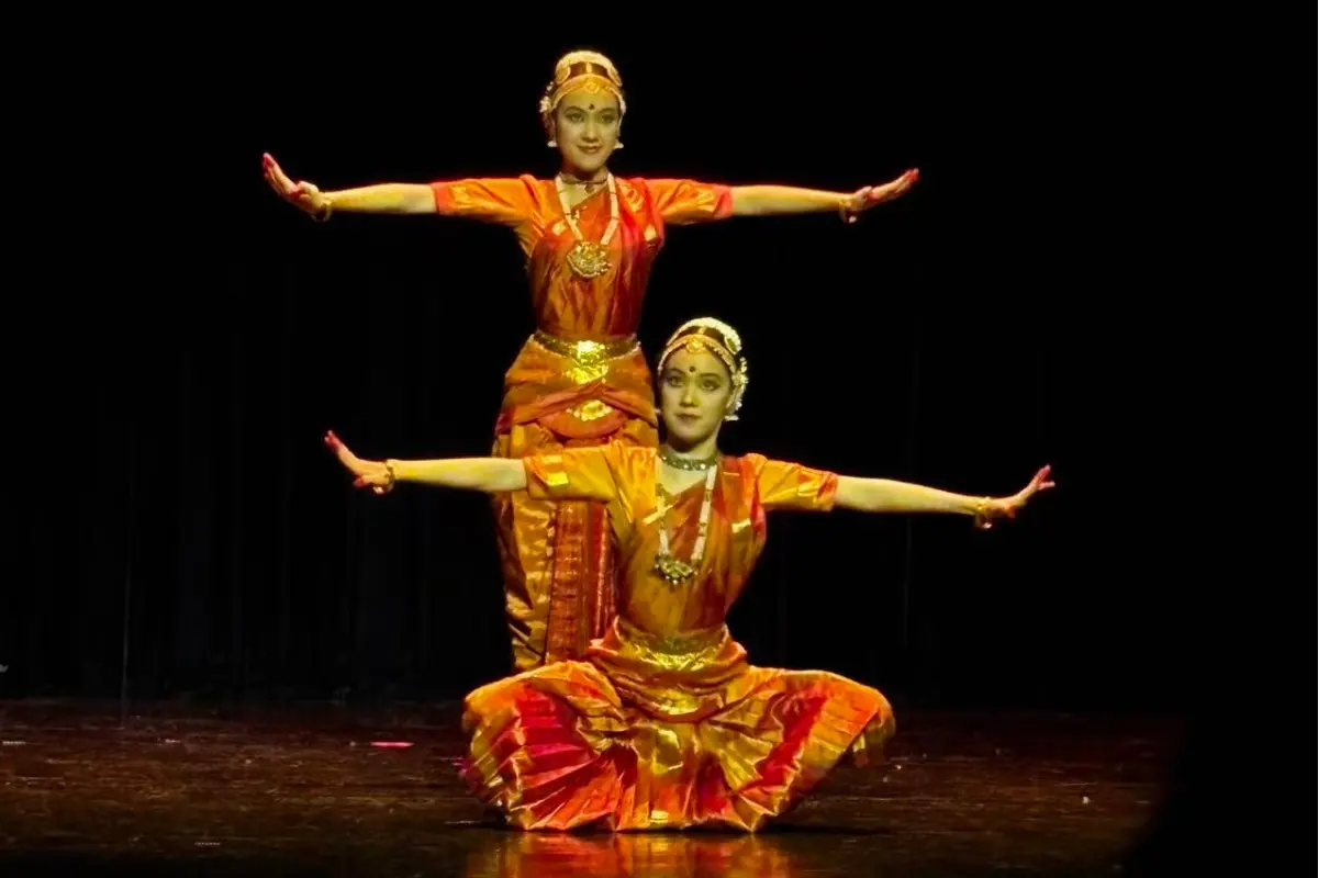Chinese twins, Jin Yanshu and Jin Yanai, performing their Arangetram in Beijing | Photo: @EOIBeijing/X