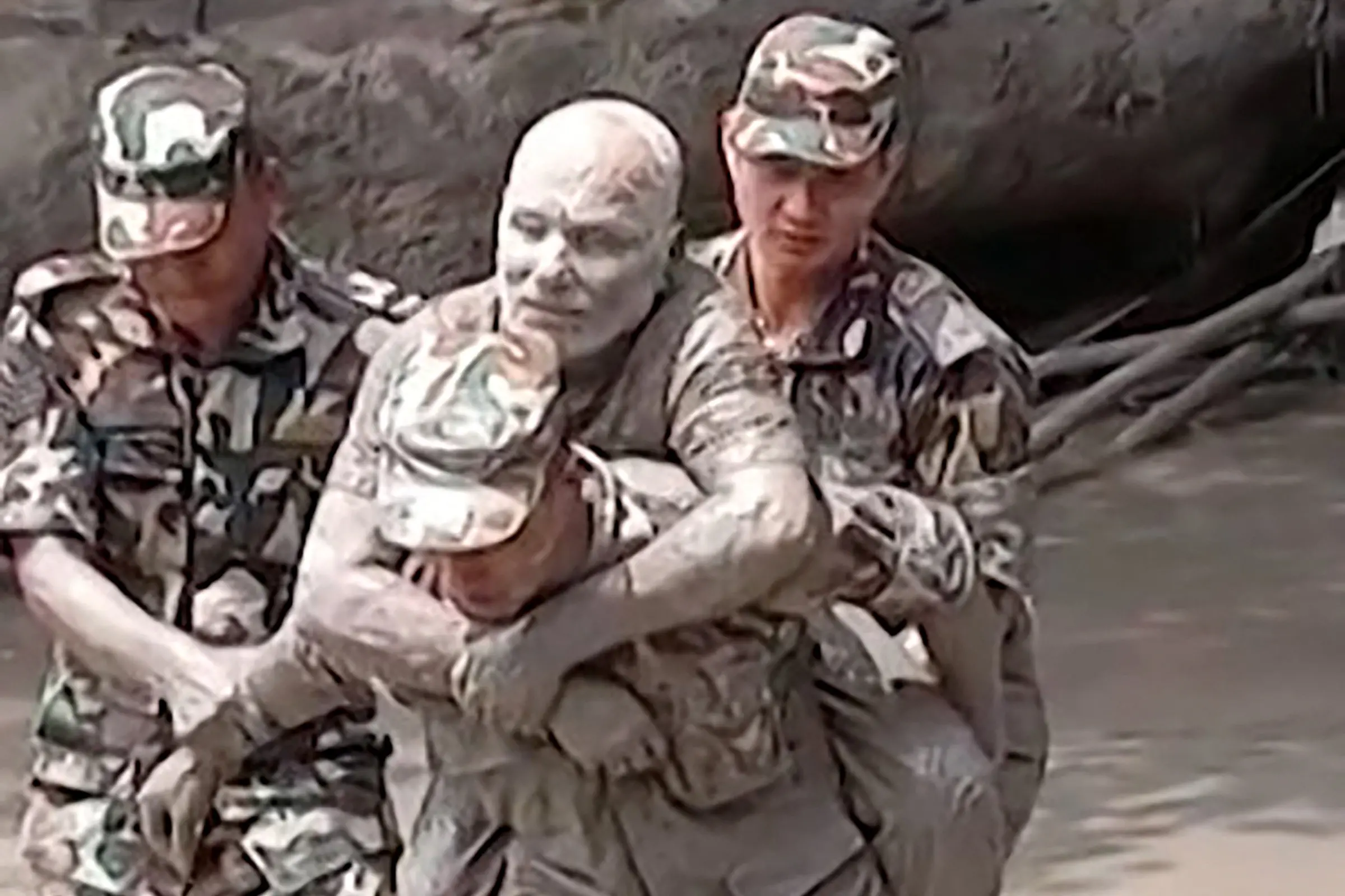This handout video grab from a UGC footage of Nepal Army taken and released on August 26, 2026 shows a military personnel rescuing a man stranded by massive floods and landslides along the Nepal-Tibet border.| Photo: Nepalese Army
