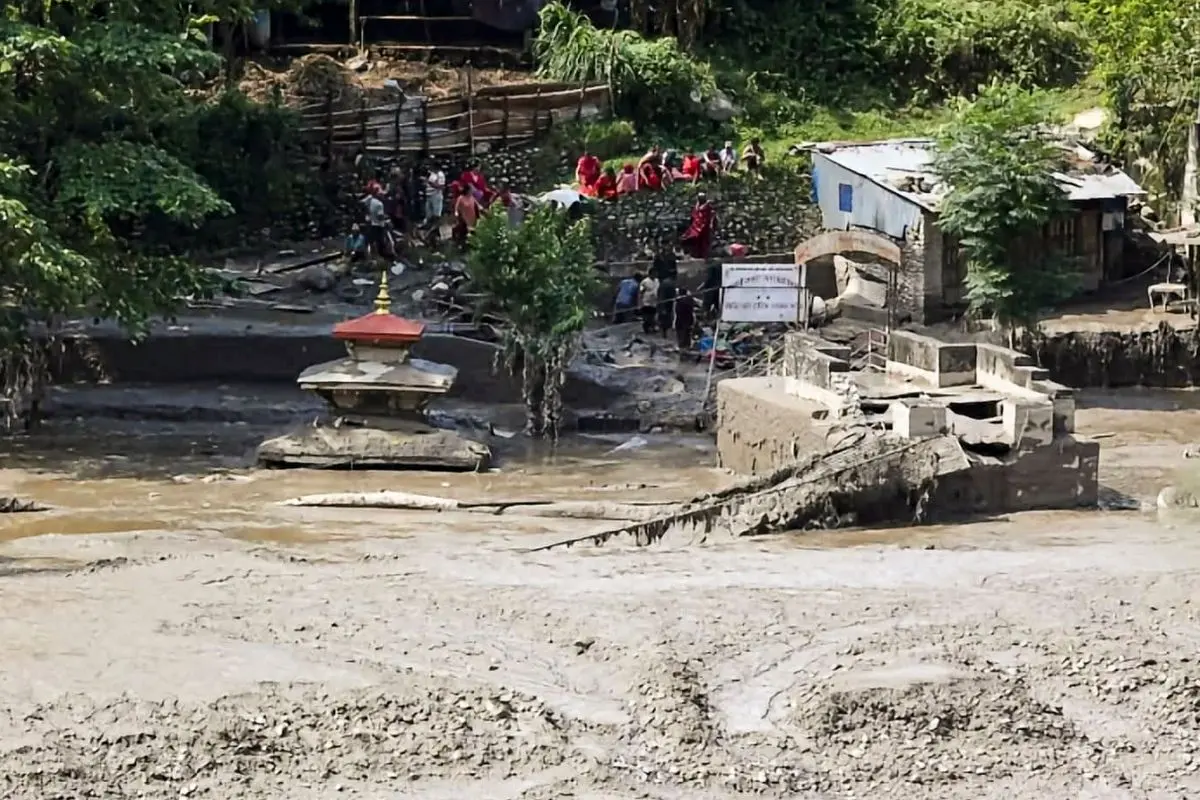 People at the flood affected Beni Ghat area, in Dhading district, Nepal, Wednesday, Aug. 26, 2026. (PTI Photo)