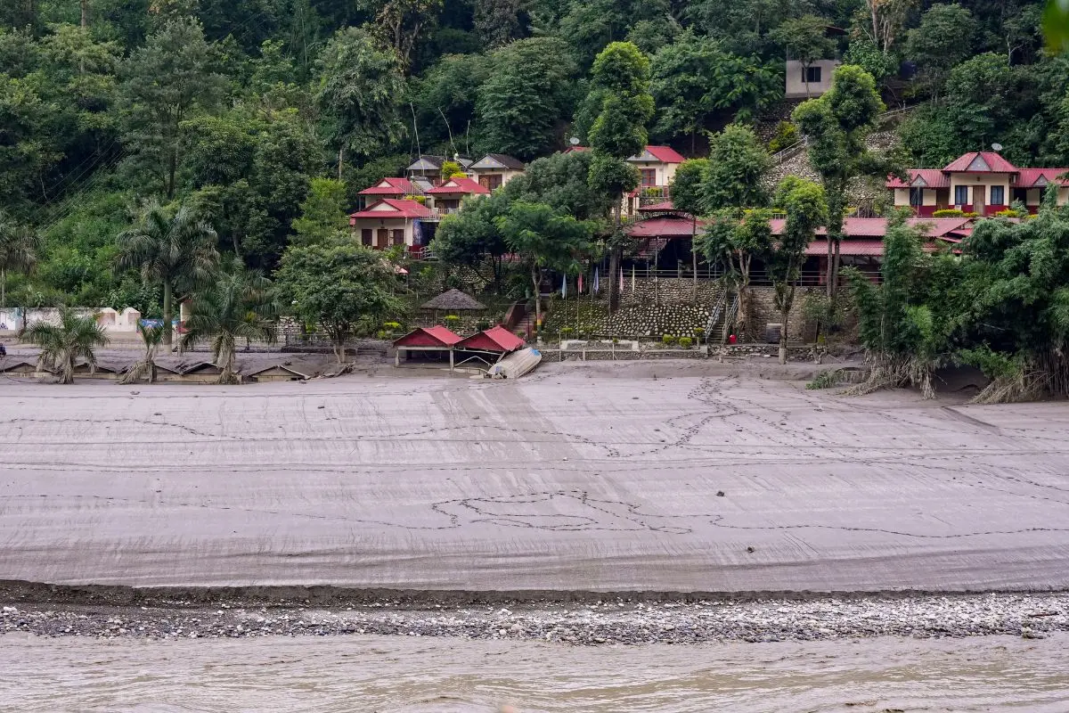 A view of a partially covered residential area after flash floods, in Dhading, Nepal, Thursday, Aug. 27, 2026 (Photo: PTI)
