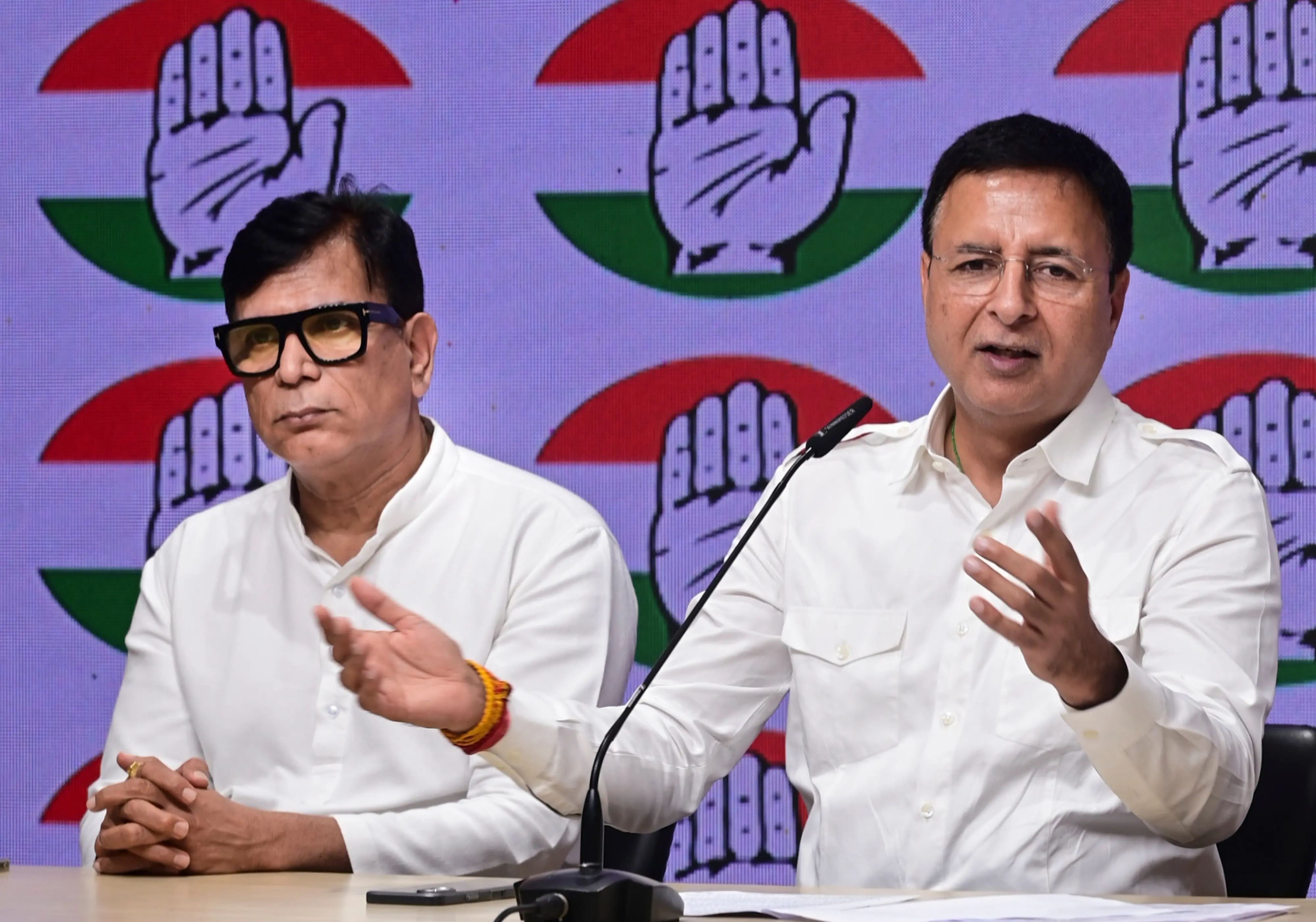 AICC General Secretary and MP Randeep Singh Surjewala, right, and party leader Abhay Dubey | Photo: PTI