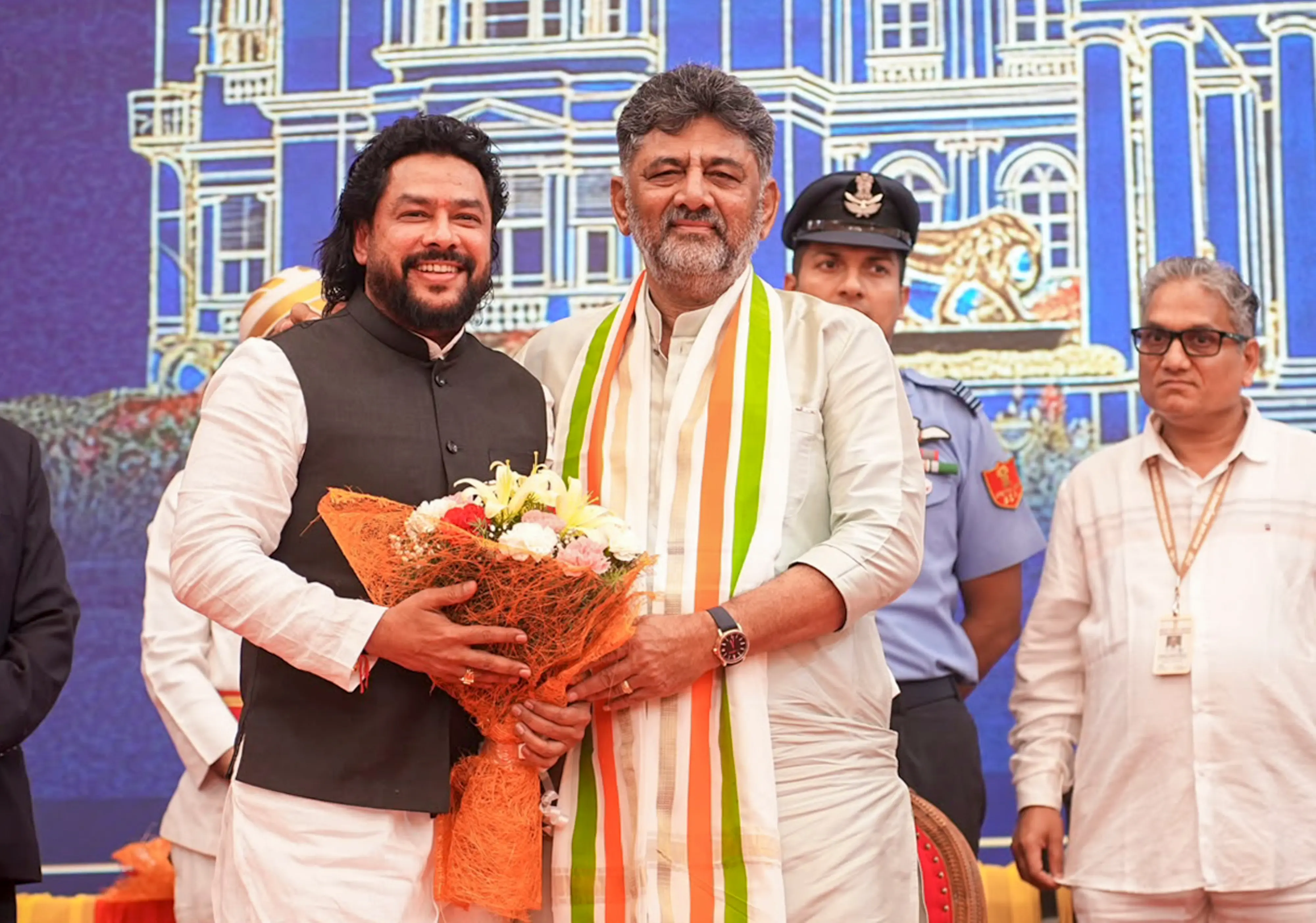 Karnataka Chief Minister DK Shivakumar is greeted by Cabinet minister B Nagendra.| File image: PTI