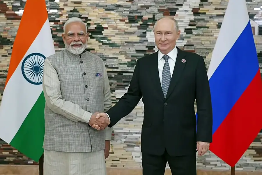 Prime Minister Narendra Modi and Russian President Vladimir Putin exchange a handshake ahead of their bilateral talks on the sidelines of the Shanghai Cooperation Organization (SCO) summit