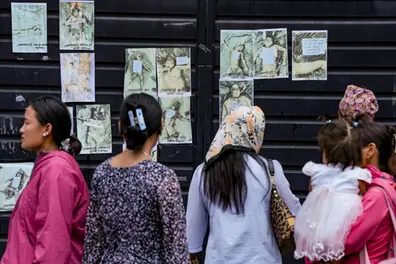 Desperate search: Nepal flood-hit families scan hospital photos for missing loved ones