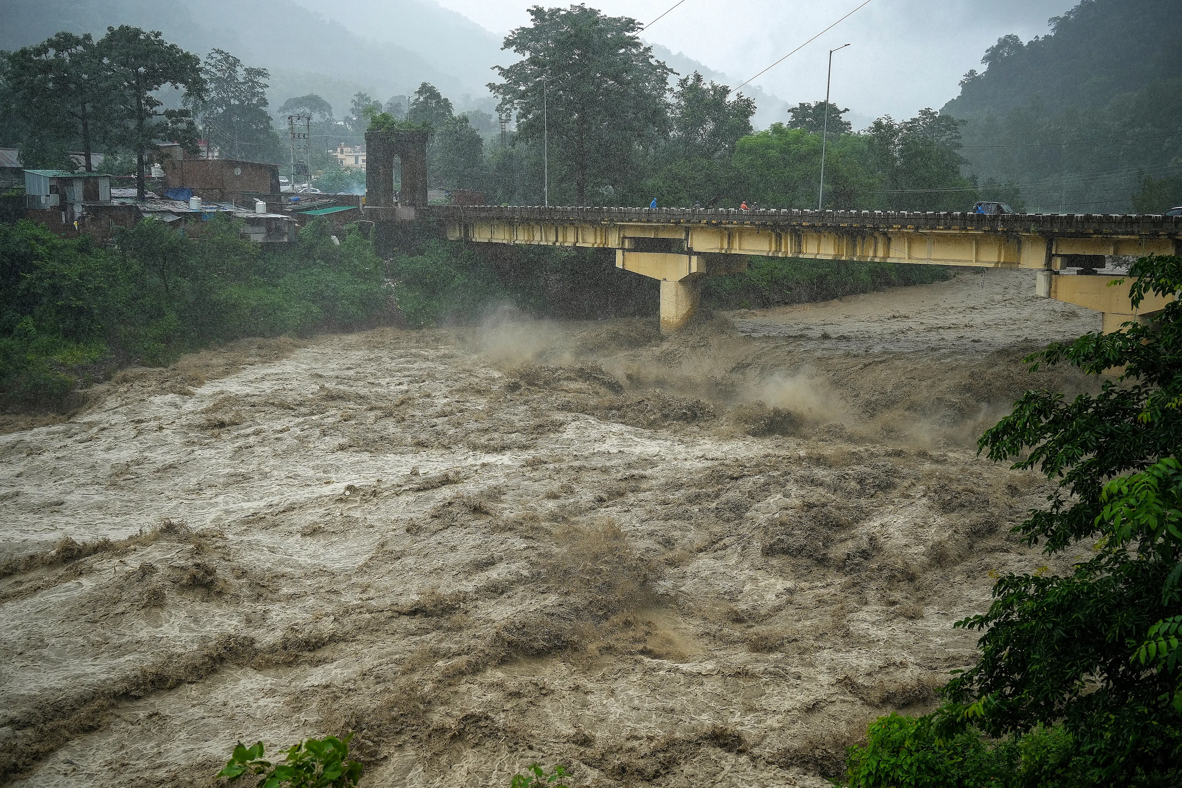 A swollen Gaula river as the water level rises following incessant heavy rainfall at Haldwani, in Nainital district, Uttarakhand.| Photo: PTI