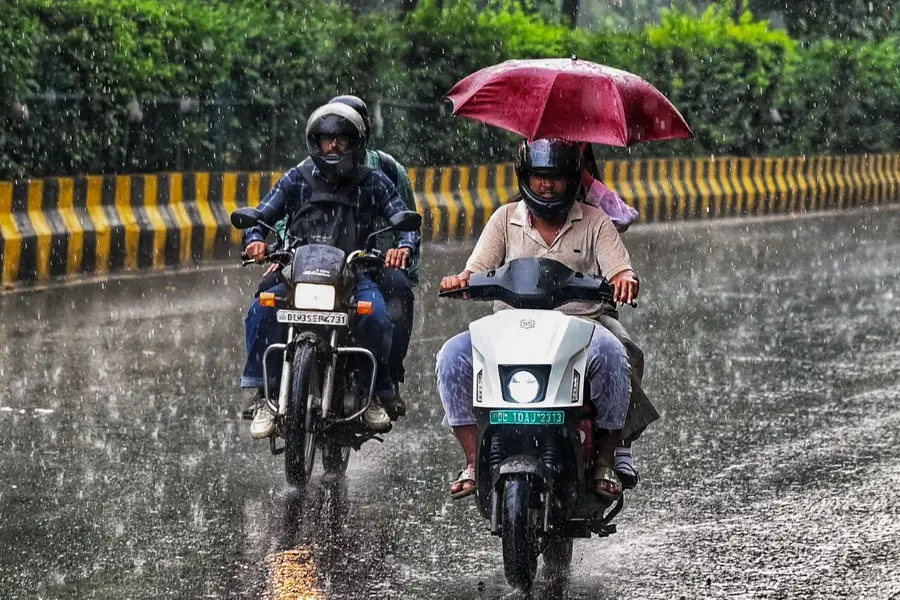 Heavy rain lashes Delhi as IMD issues red alert for intense showers, thunderstorms