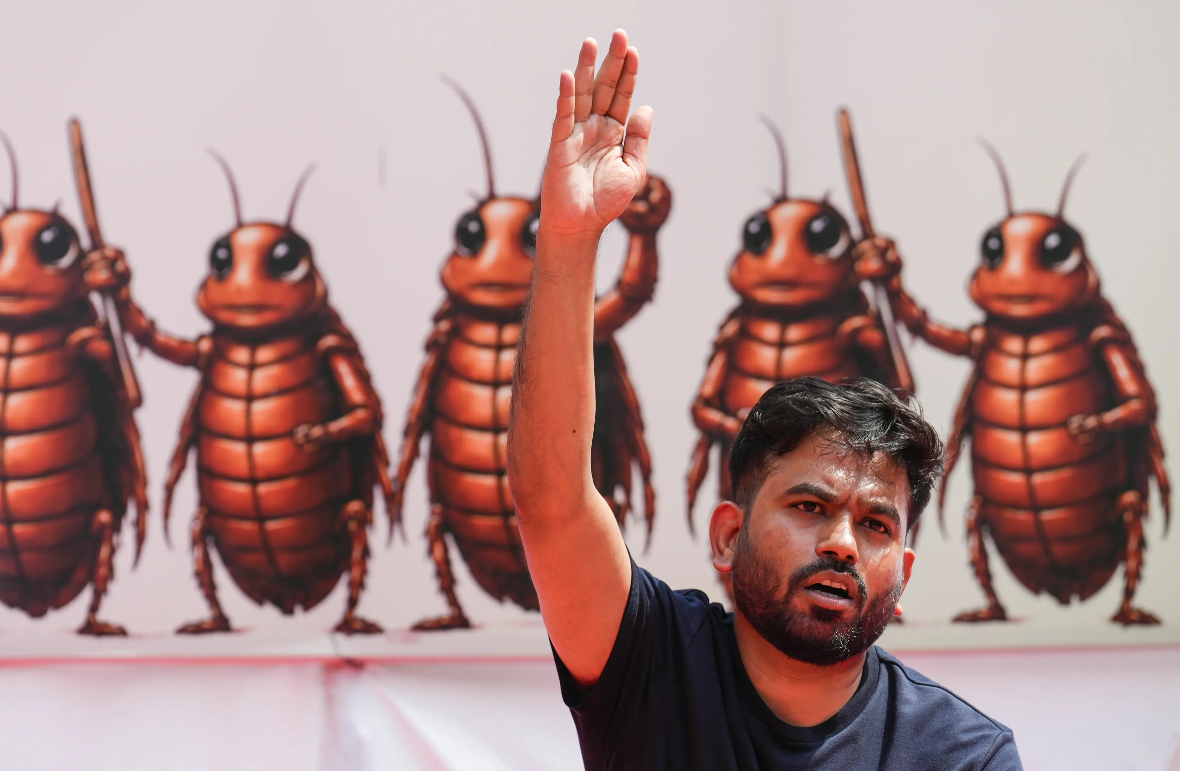 Cockroach Janta Party (CJP) founder Abhijeet Dipke during a protest over alleged examination irregularities, repeated paper leaks and demands for accountability from the government, in New Delhi.| Photo: PTI