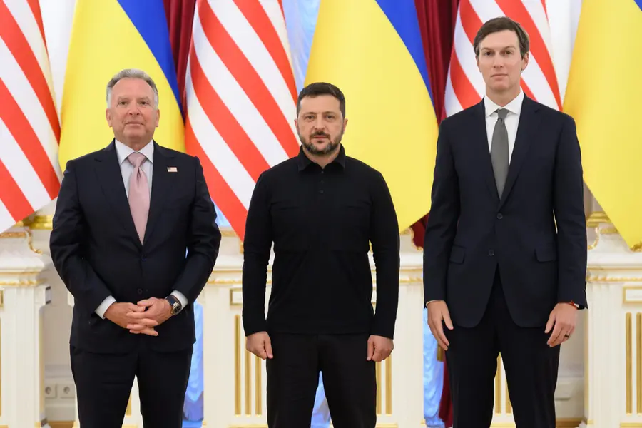 In this photo provided by the Ukrainian Presidential Press Office, Ukraine's President Volodymyr Zelenskyy, center, U.S. President Donald Trump's envoys Jared Kushner, right, and Steve Witkoff pose for photo in Kyiv