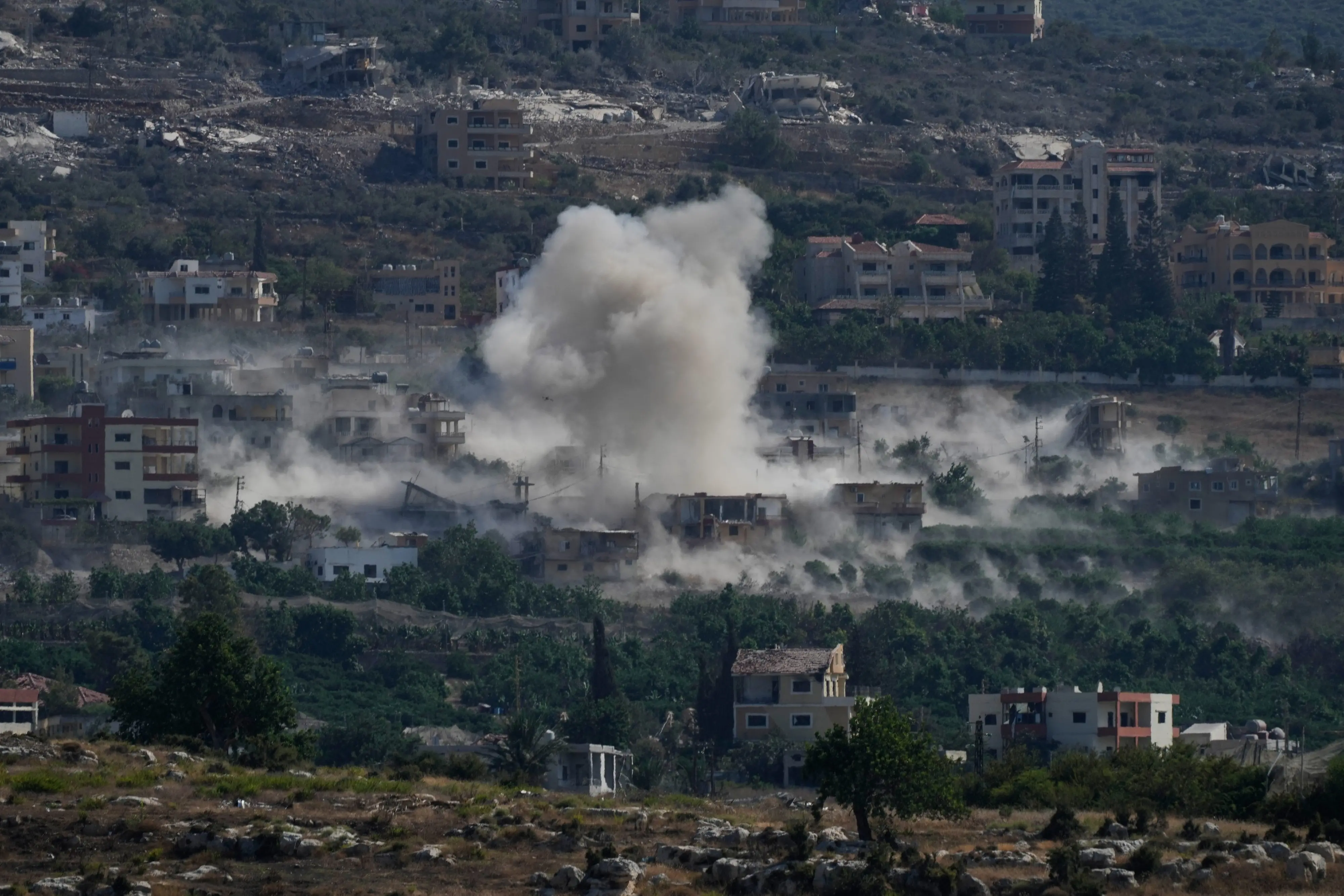 Smoke rises as Israeli forces demolish homes in Mansouri village, southern Lebanon.| Photo: PTI