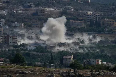 Israeli airstrikes hit southern Lebanon, killing 9 including women and child