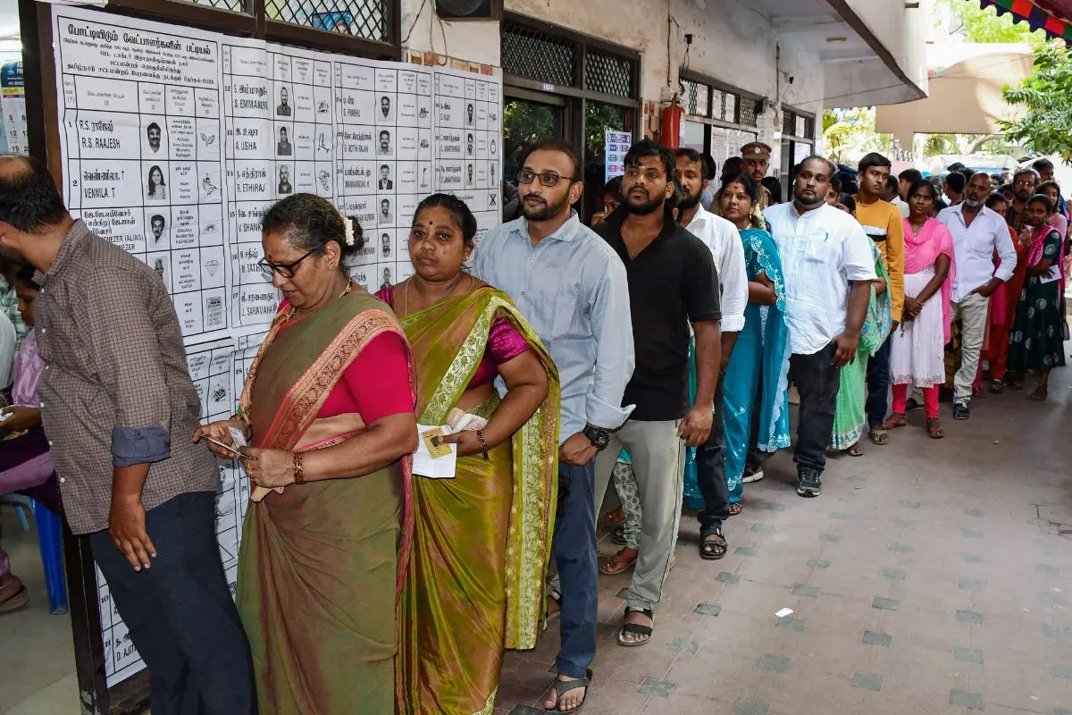 Voters queue up as they wait to cast their votes during the first phase of the Tamil Nadu Assembly election, in Chennai on Thursday (Photo: ANI)