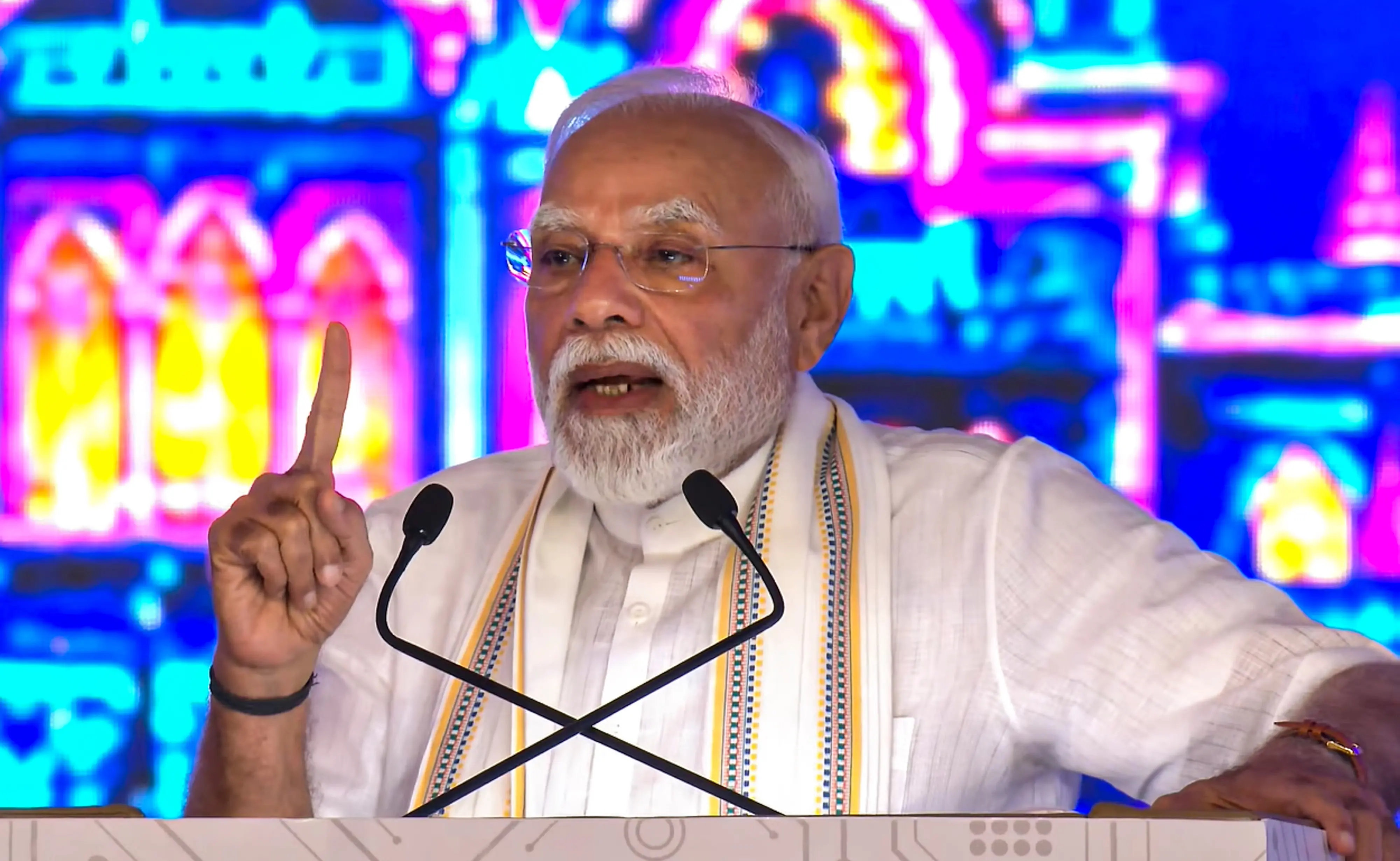 PM Modi addresses the inauguration and foundation stone laying of Rs 35,000 crore development projects at an event, in Vadodara, Gujarat | Photo: PTI
