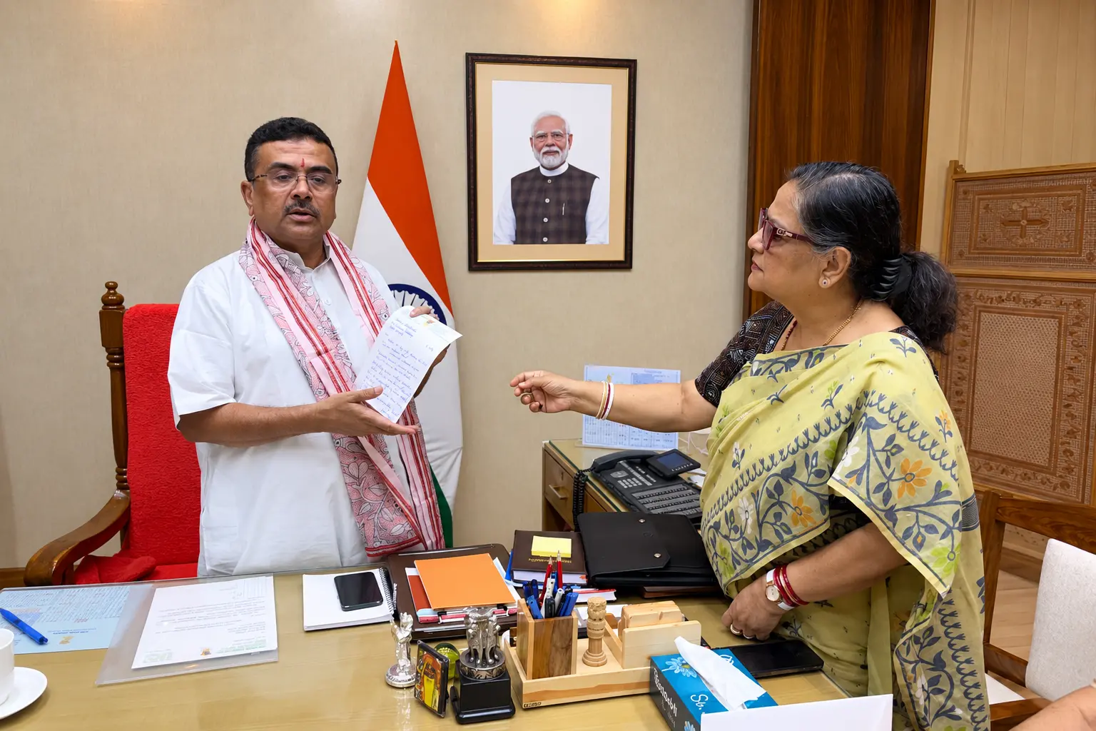 BJP leader Suvendu Adhikari meets Kakoli Ghosh Dastidar, who submitted a complaint over alleged social media abuse.