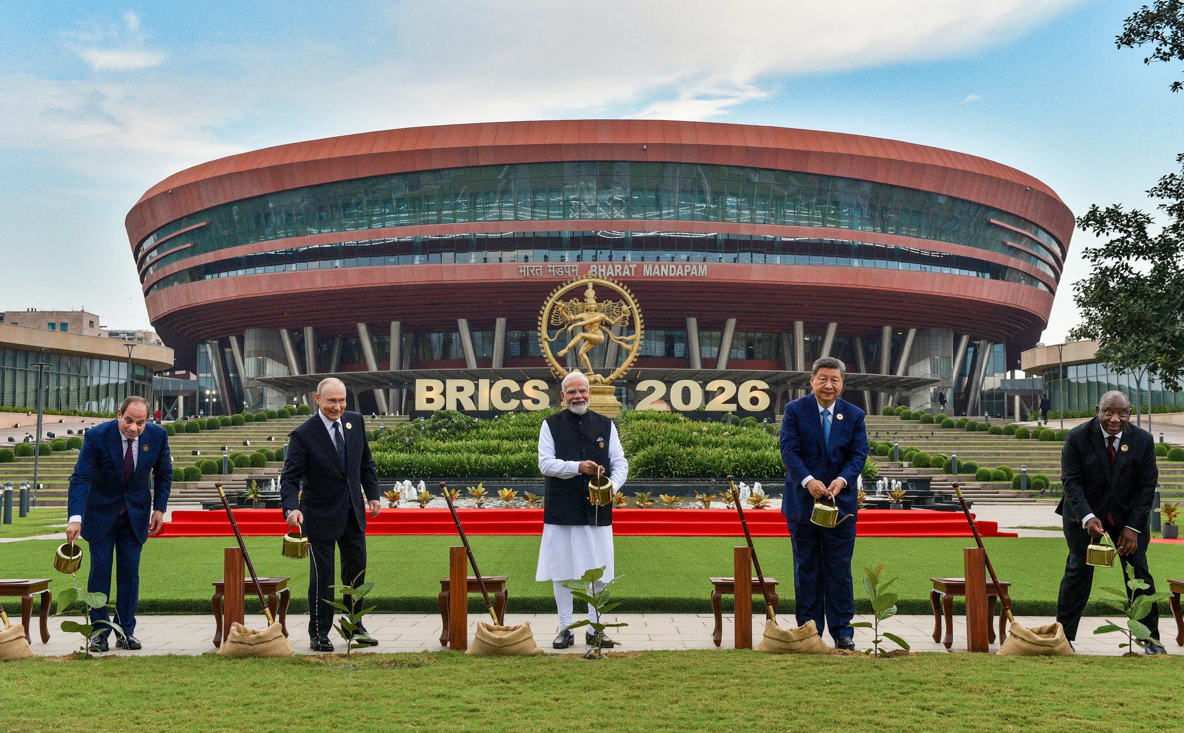 **EDS: THIRD PARTY IMAGE** In this image received on Sept. 12, 2026, from left, Egyptian President Abdel Fattah el-Sisi, Russian President Vladimir Putin, Prime Minister Narendra Modi, Chinese President Xi Jinping and South African President Cyril Ramaphosa during a joint tree plantation initiative amid the ongoing 18th BRICS Summit, at the Bharat Mandapam, in New Delhi. (PMO via PTI Photo)(PTI09_12_2026_000555B)