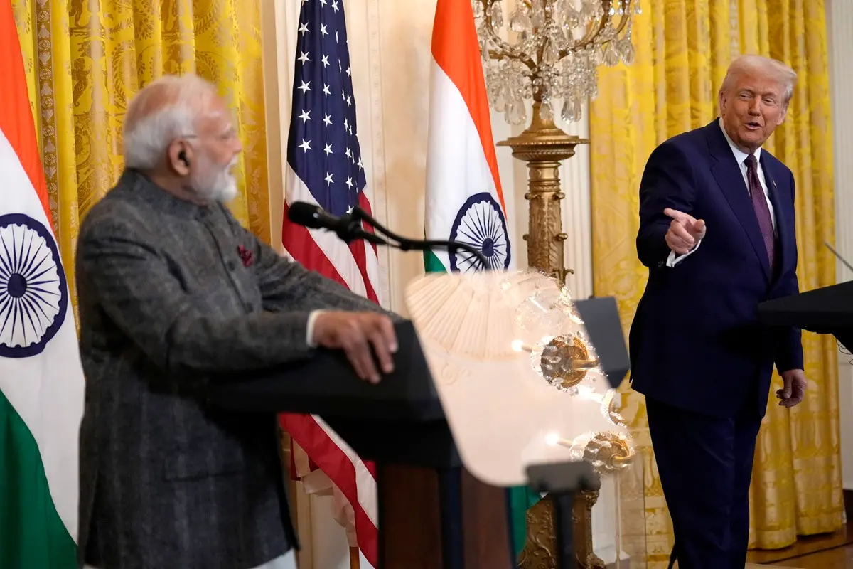 President Donald Trump, right, speaks as India's Prime Minister Narendra Modi listens during a news conference in the East Room of the White House | File photo: PTI