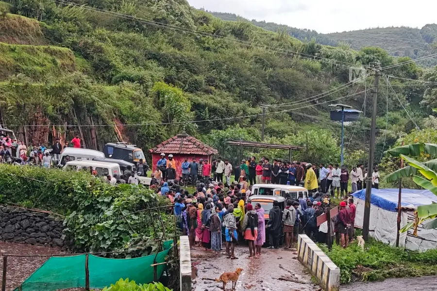 Locals and rescue workers conduct rescue operations at the accident site