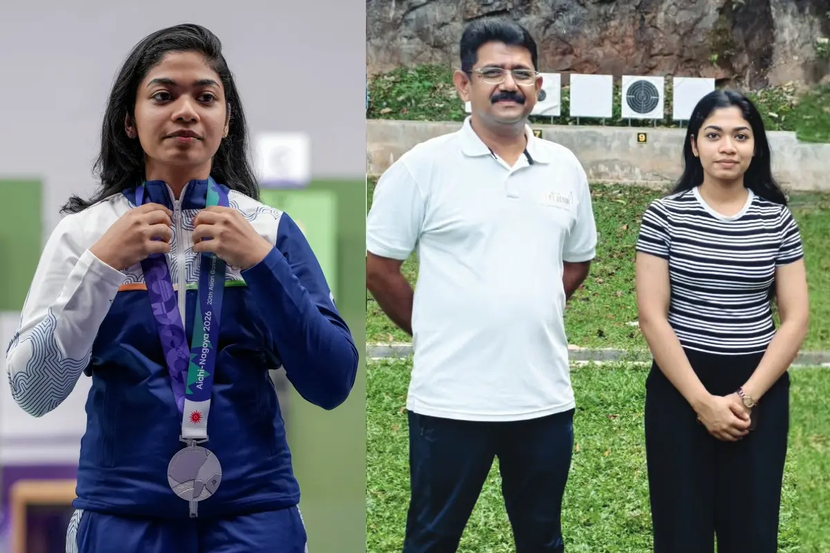 വിദർശ കെ. വിനോദ് കോഴിക്കോട് ജില്ലാ റൈഫിൾ അസോസിയേഷന്റെ മുഖ്യപരിശീലകൻ വി. വിപിൻദാസിനൊപ്പം
