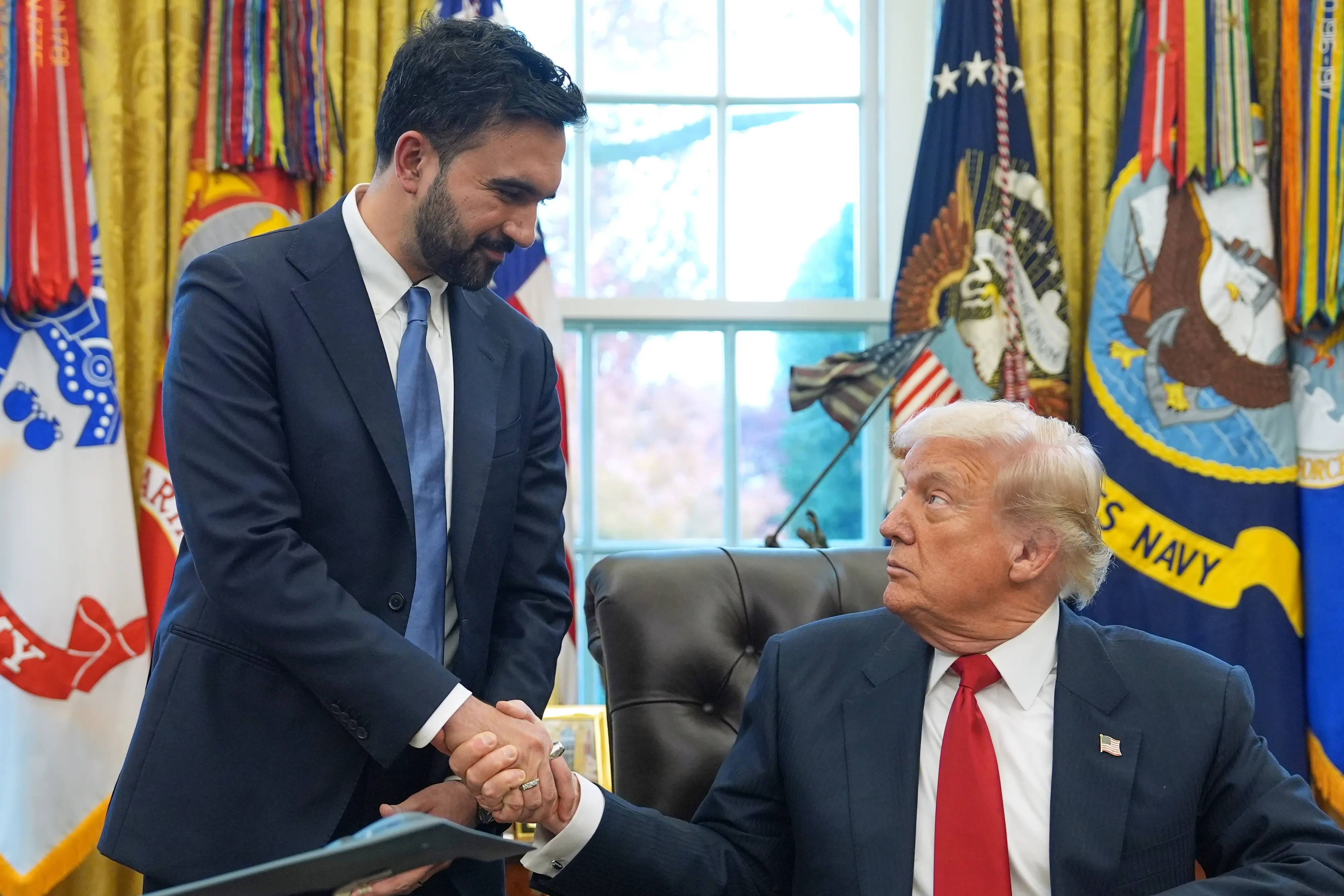 US President Donald Trump shakes hands with New York City Mayor-elect Zohran Mamdani in the Oval Office of the White House.| Photo: AFP