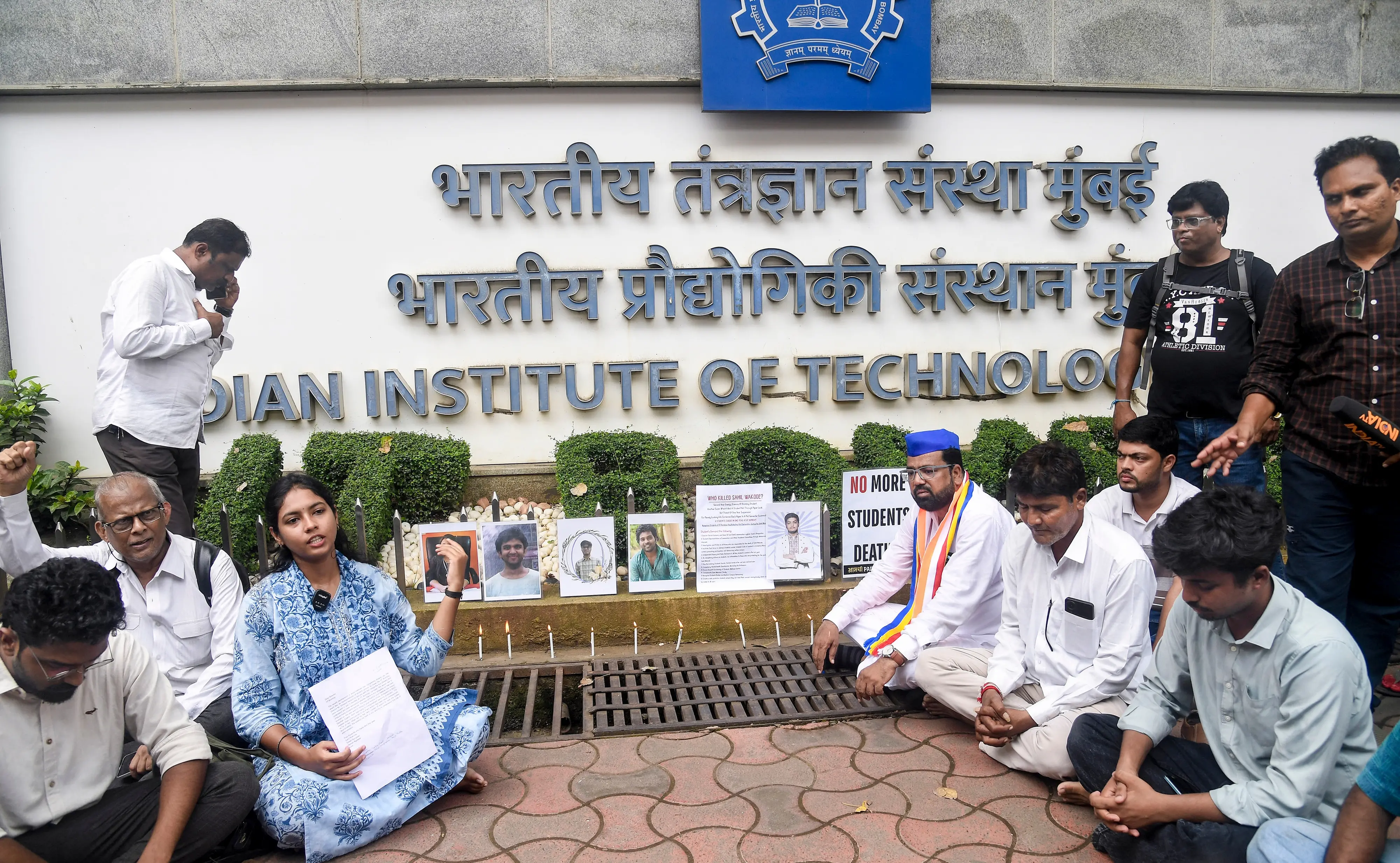 Demonstrators stage a candlelight protest to pay tribute to the suicide victims of IIT Bombay, in Mumbai.| Photo: PTI