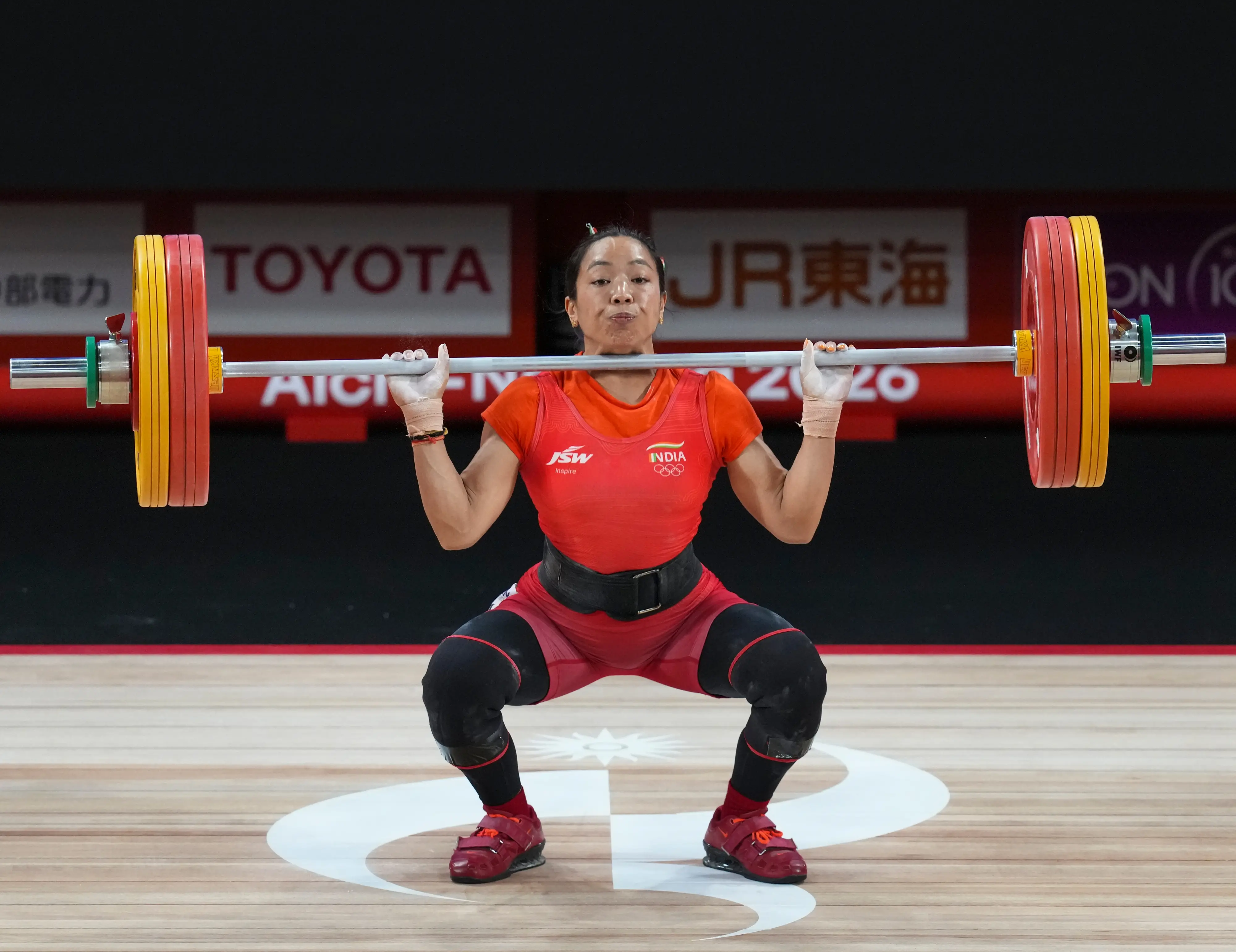India's Mirabai Chanu competes in the Women's 49kg Group A weightlifting final match during the 20th Asian Games, in Nagoya, Japan, Wednesday, Sept. 23, 2026. Chanu clinches silver medal.| Photo: PTI