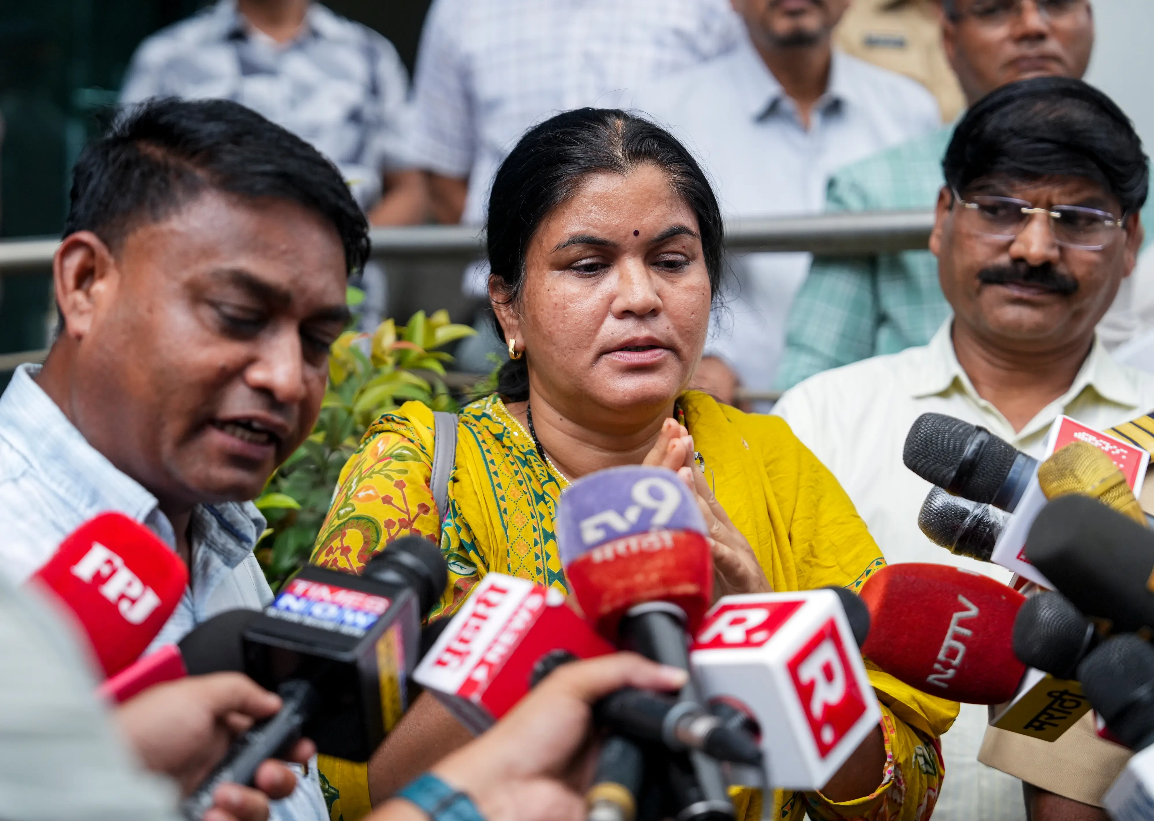 Ravindra Wakode and Sonali Wakode, parents of IIT Bombay student Sahil Wakode, interact with media personnel after visiting the Crime Branch office in connection with their son's death case, in Mumbai, Maharashtra | Photo: PTI