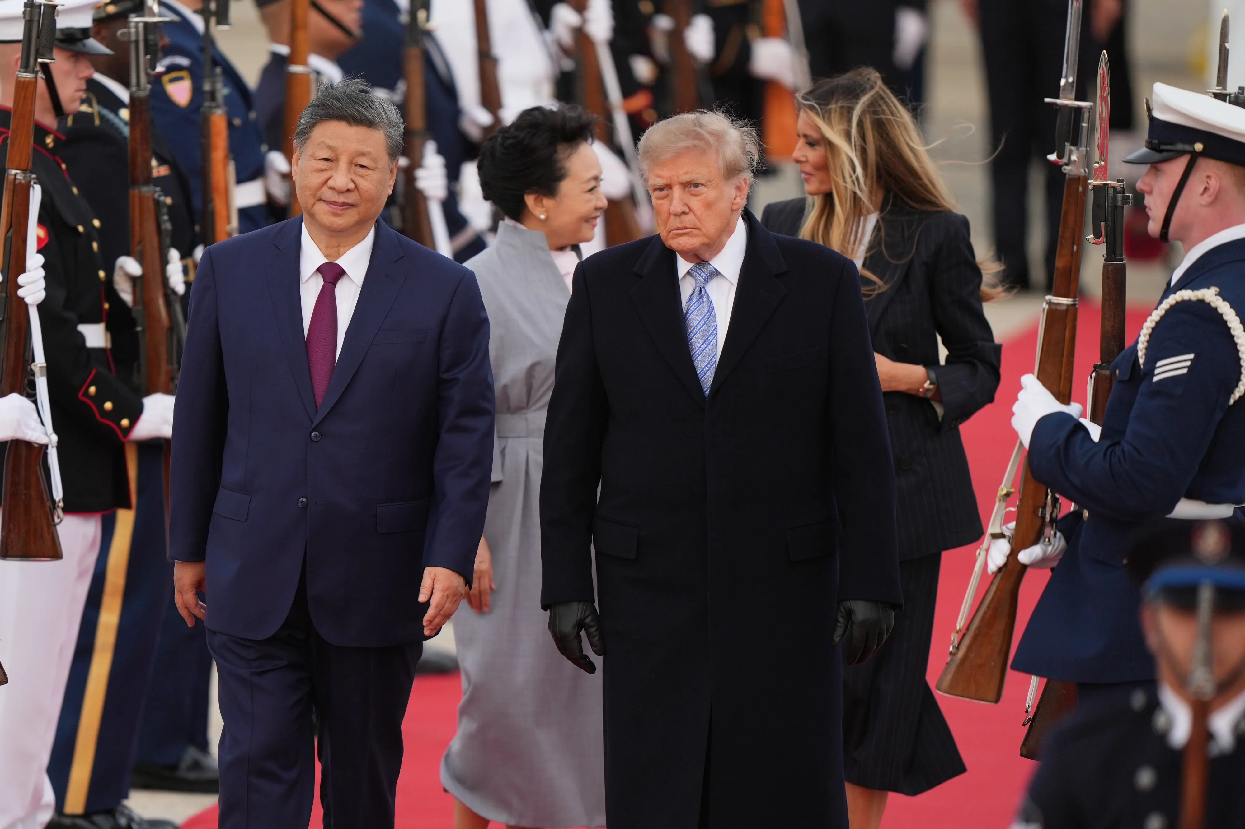 US President Donald Trump and first lady Melania Trump greet Chinese President Xi Jinping and his wife Peng Liyuan as they arrive at Joint Base Andrews.| Photo: PTI