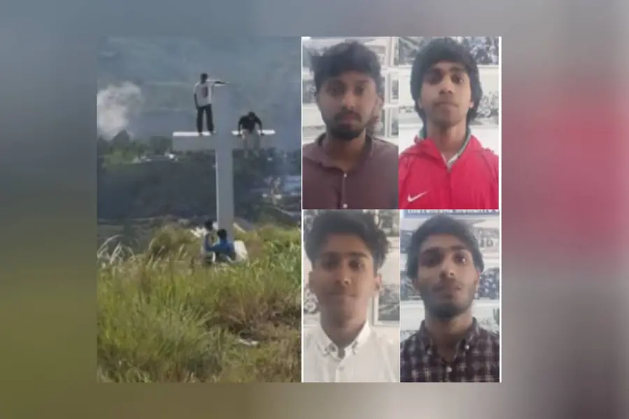 നീലക്കുറിഞ്ഞി കാണാനെത്തി, കുരിശിന് മുകളിൽക്കയറി ഫോട്ടോയെടുത്ത് പ്രചരിപ്പിച്ചു; നാലുപേർ അറസ്റ്റിൽ
