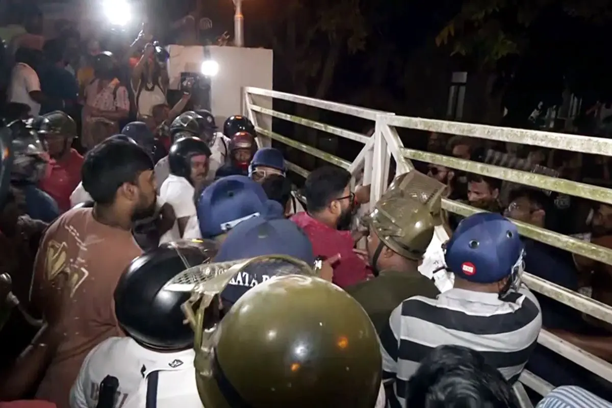 Security personnel deployed at the site after a clash broke out between members of the SFI and the Akhil Bharatiya Grahak Panchayat during an event organised by the Akhil Bharatiya Grahak Panchayat at the SRFTI auditorium, in Kolkata on Sunday. (ANI Video Grab)