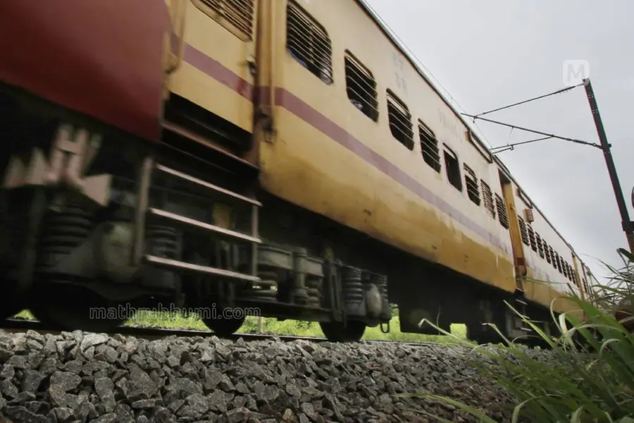 train track indian railways kerala coach door accident stone