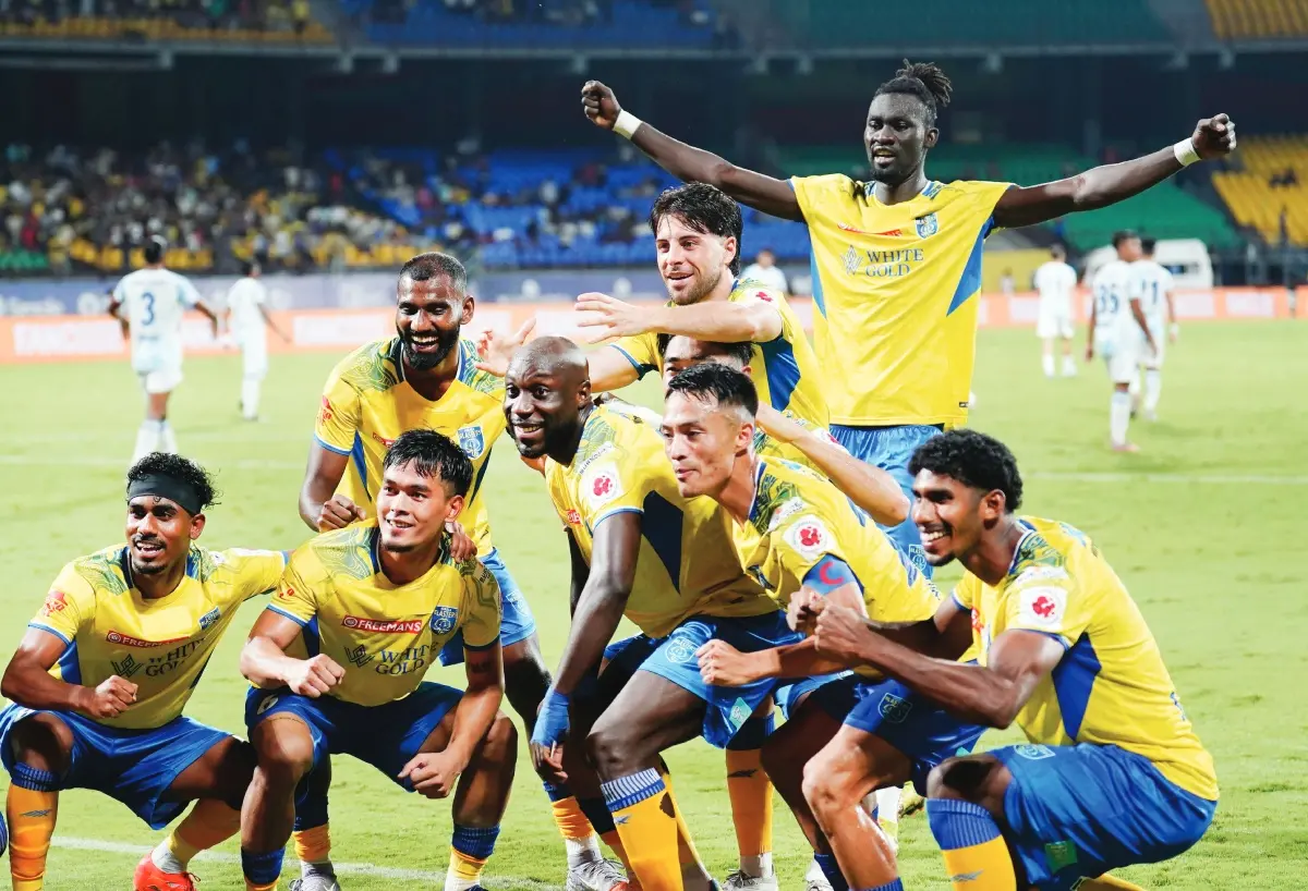 Kerala Blasters player Kevin Yoke celebrates a goal with his teammates | Photo: Amal Manav