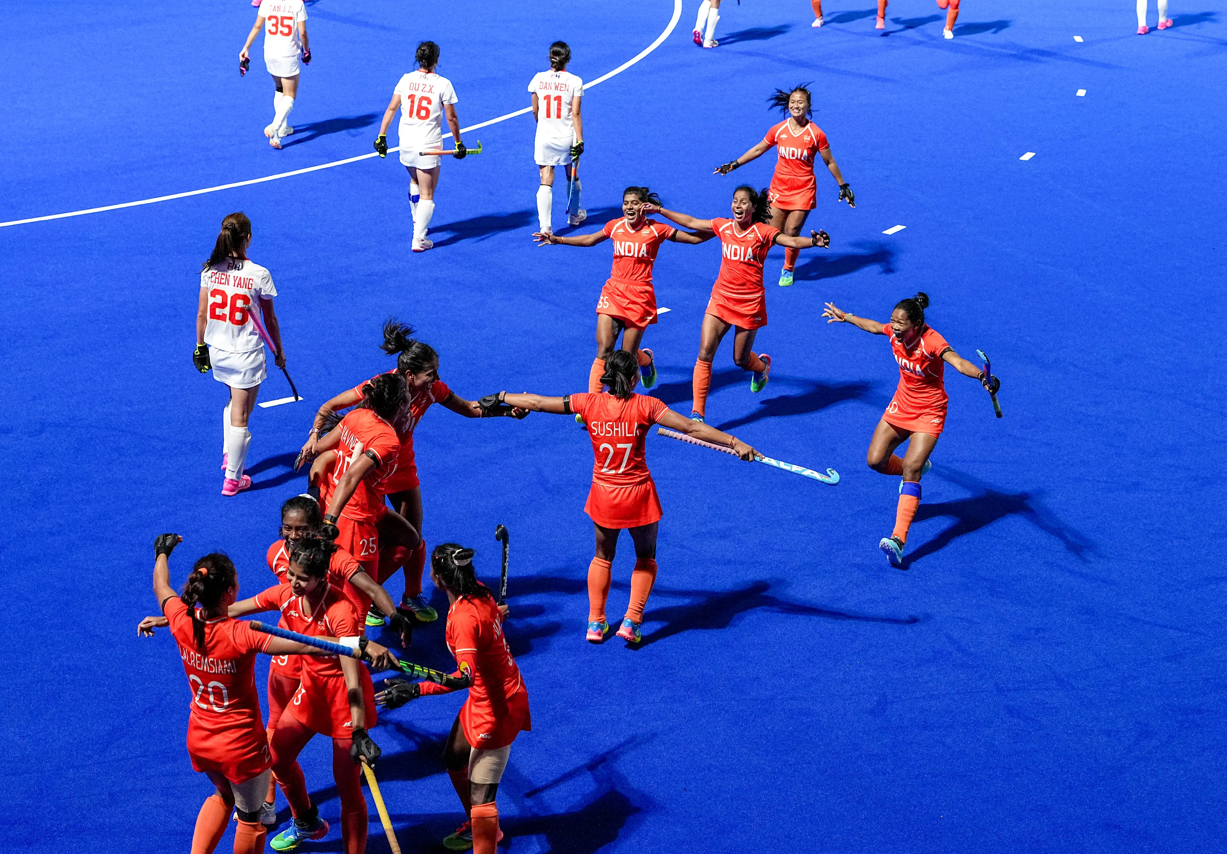 India's players celebrate after winning the women's final gold medal Hockey match as they defeat China in the ongoing Asian Games 2026 | Photo: PTI