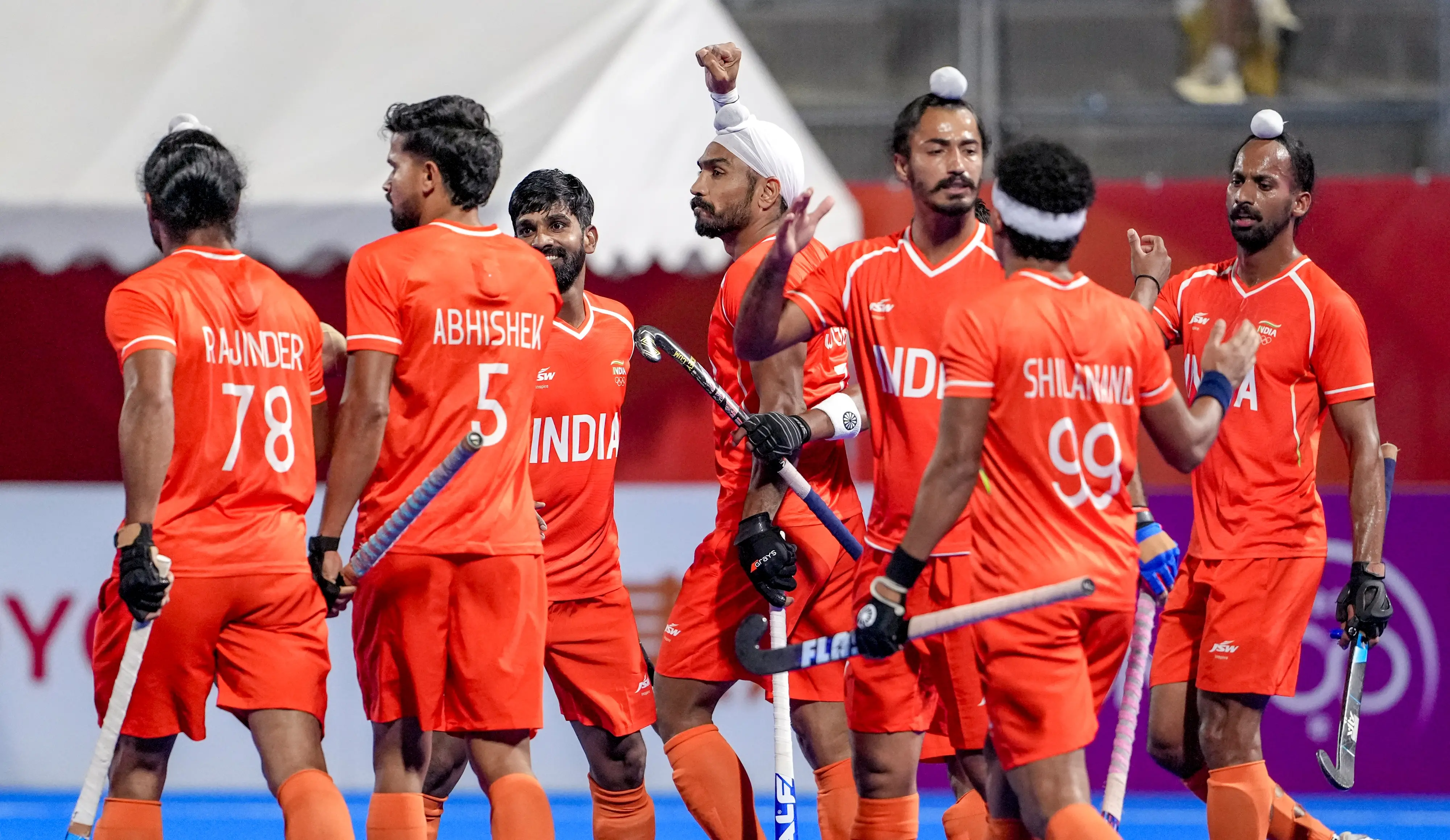 India's players celebrate a goal during the men's Hockey final's gold medal match | Photo: PTI