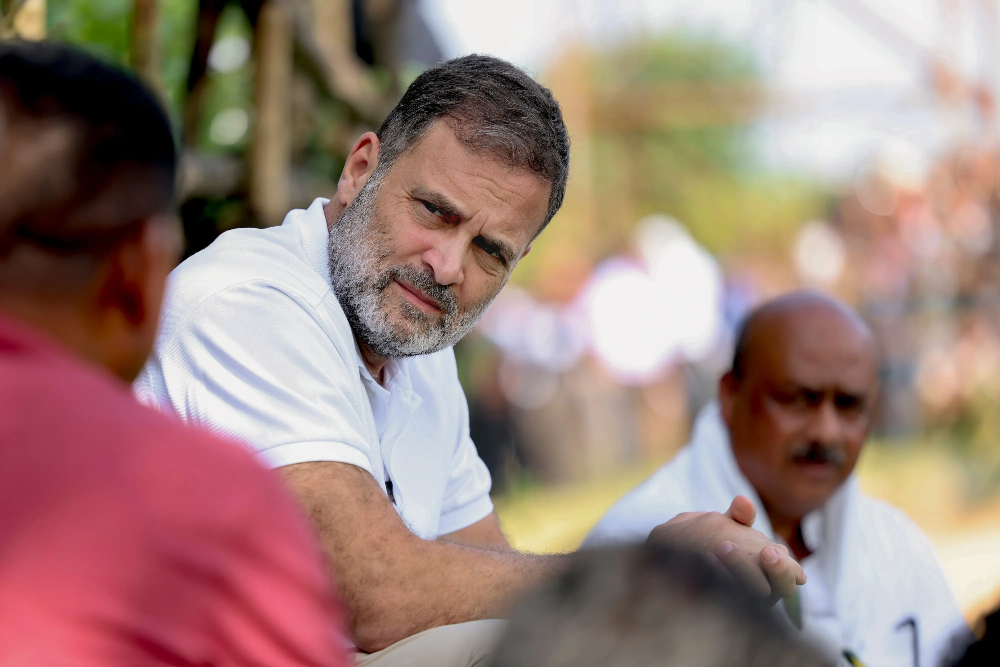 Leader of Opposition in the Lok Sabha Rahul Gandhi interacts with tribal families affected by malnutrition and disease outbreaks, in Balaghat district, Madhya Pradesh.| Photo: PTI