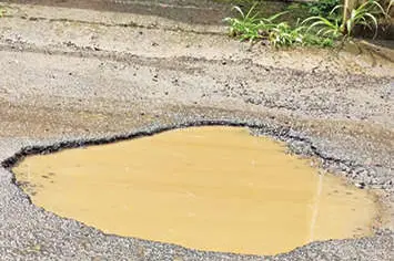 വീണ്ടും കുഴികൾ നിറഞ്ഞ് കോളേജ് റോഡ്