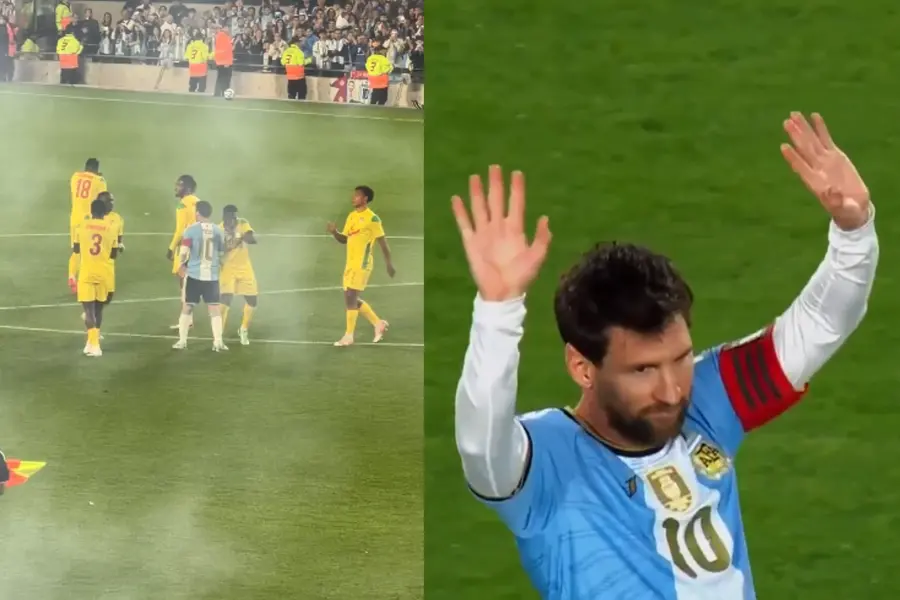 Lionel Messi waves at the fans as match was paused briefly during the 10th minute