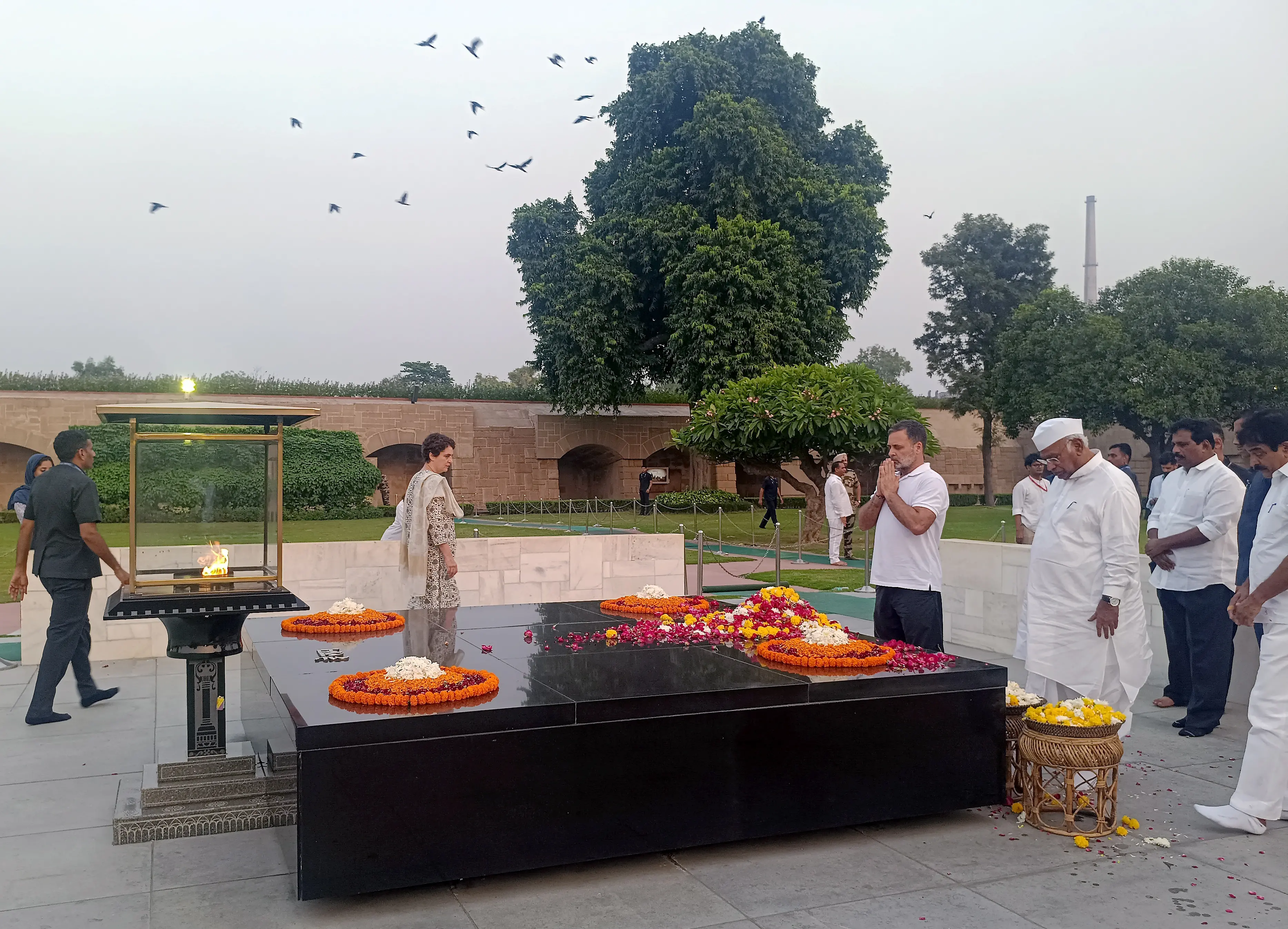 Congress President Mallikarjun Kharge and party leaders Rahul Gandhi, Priyanka Gandhi Vadra and KC Venugopal pay tribute to Mahatma Gandhi during a visit by INDIA bloc leaders at Raj Ghat | PTI