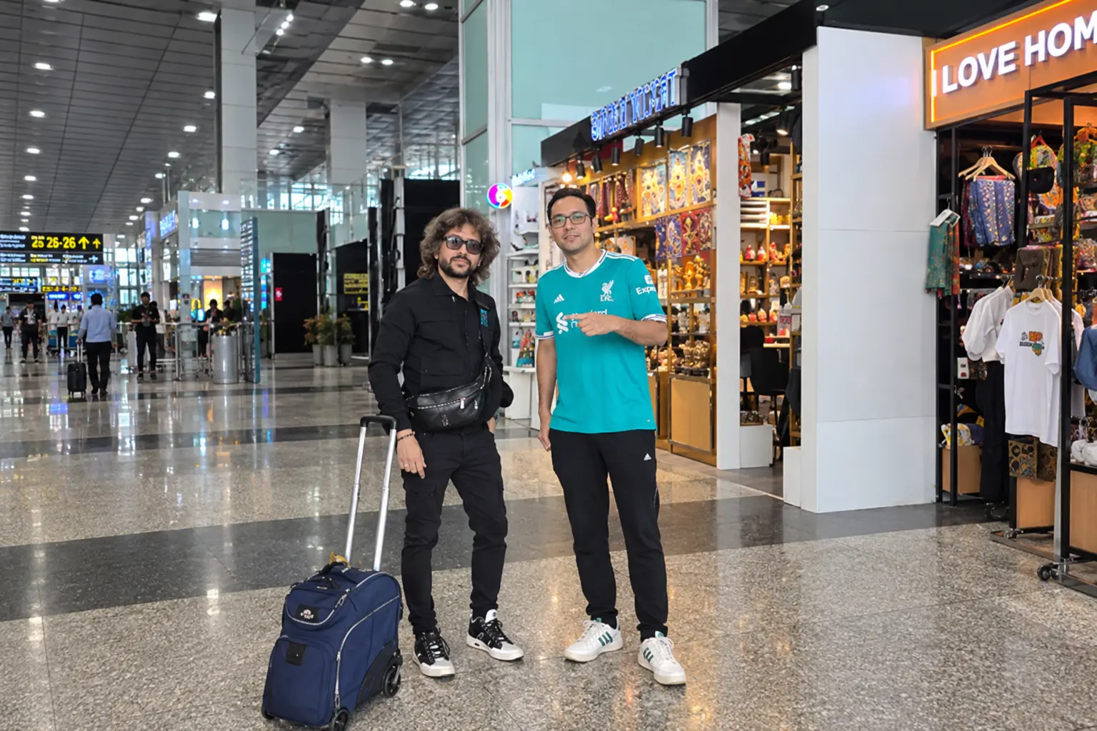 Rupam Islam (Left) and Anupam Roy at the airport as their 'Delhi Chalo' posts spark speculation about their possible participation in the CJP protest at Jantar Mantar.