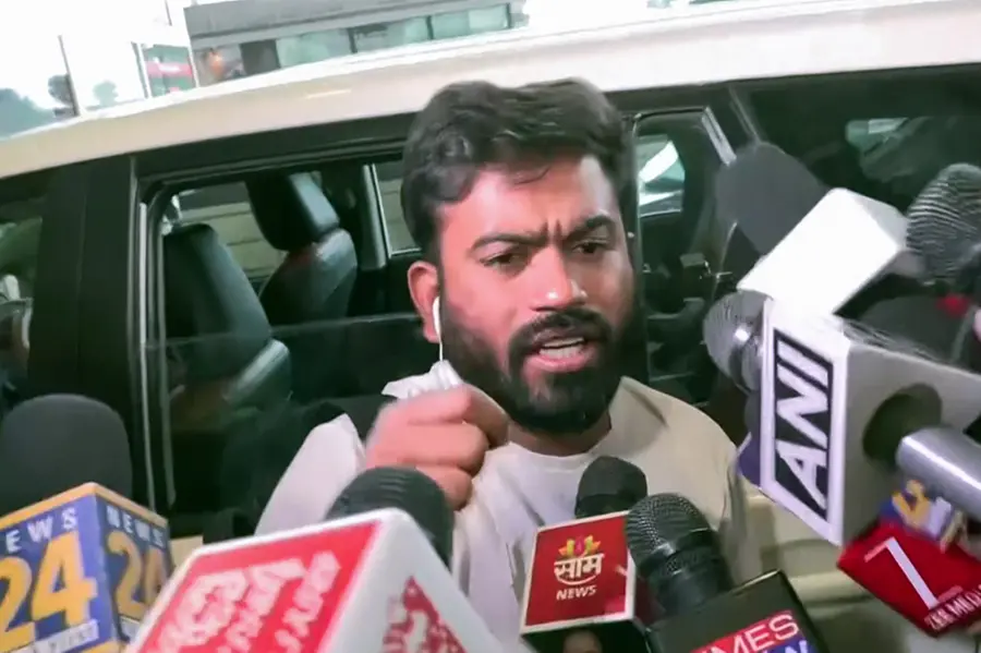 Cockroach Janta Party (CJP) Founder Abhijeet Dipke speaks to the media while detained by the Police after the flight landed at IGI Airport in New Delhi on Saturday