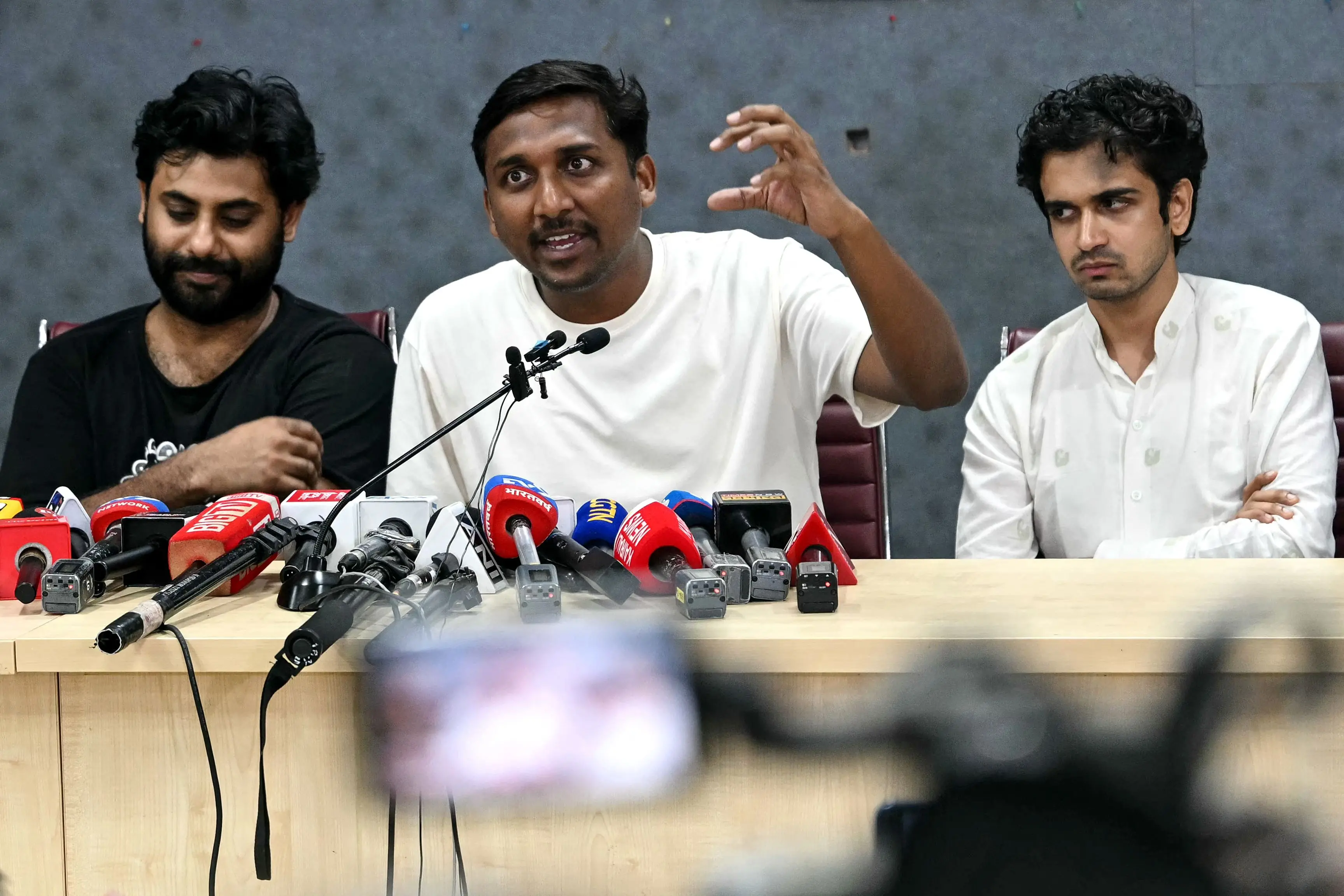 Cockroach Janata Party (CJP) leader Ajinkya Shinde (C)