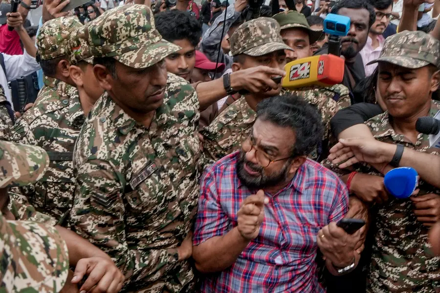 Police personnel detain CPM MP John Brittas amid continued demonstration calls by the Cockroach Janta Party (CJP) demanding the resignation of Chief Election Commissioner (CEC) | Photo: PTI
