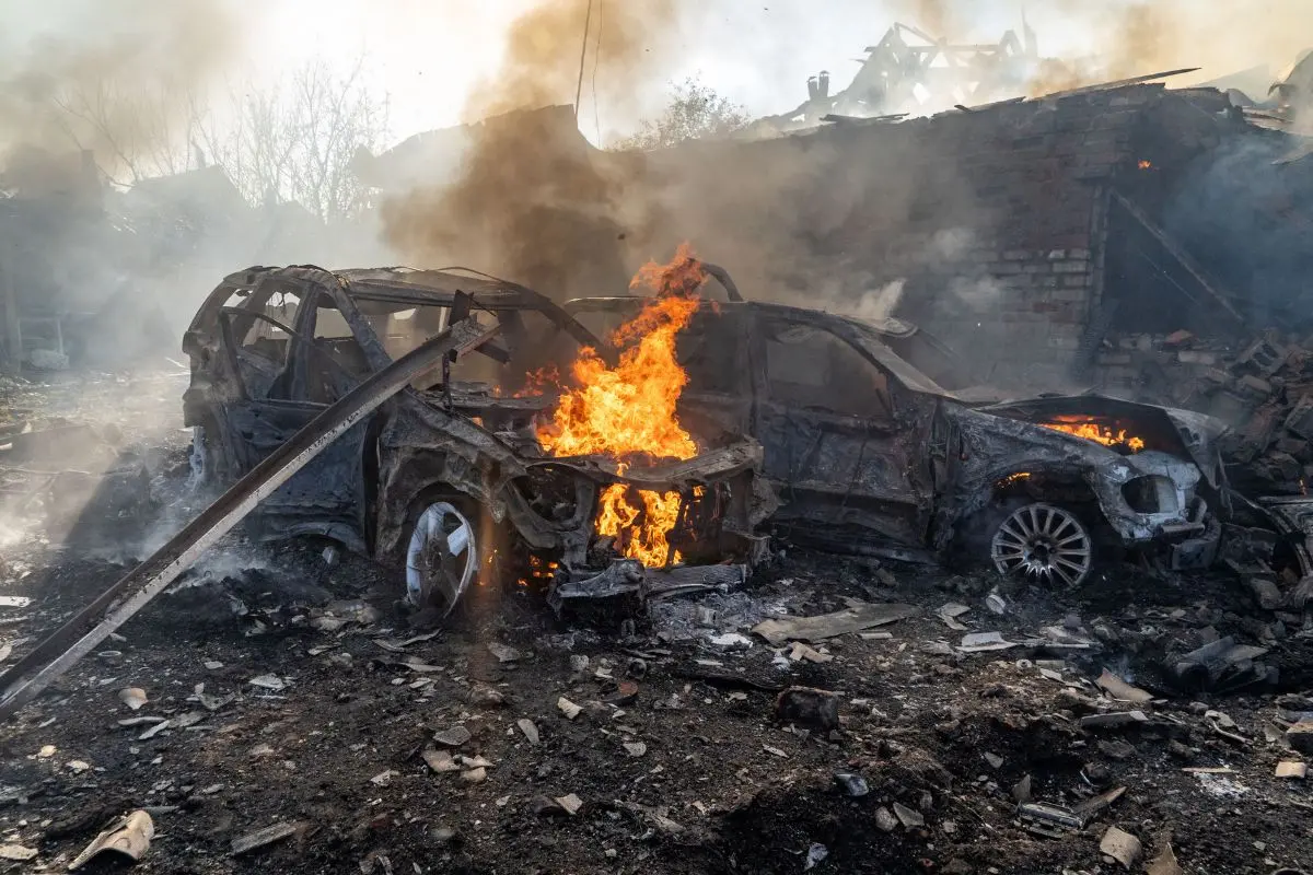Cars burn after a Russian strike on a residential neighbourhood in Kharkiv, Ukraine, Sunday, Oct. 11, 2026 (Photo: AP)