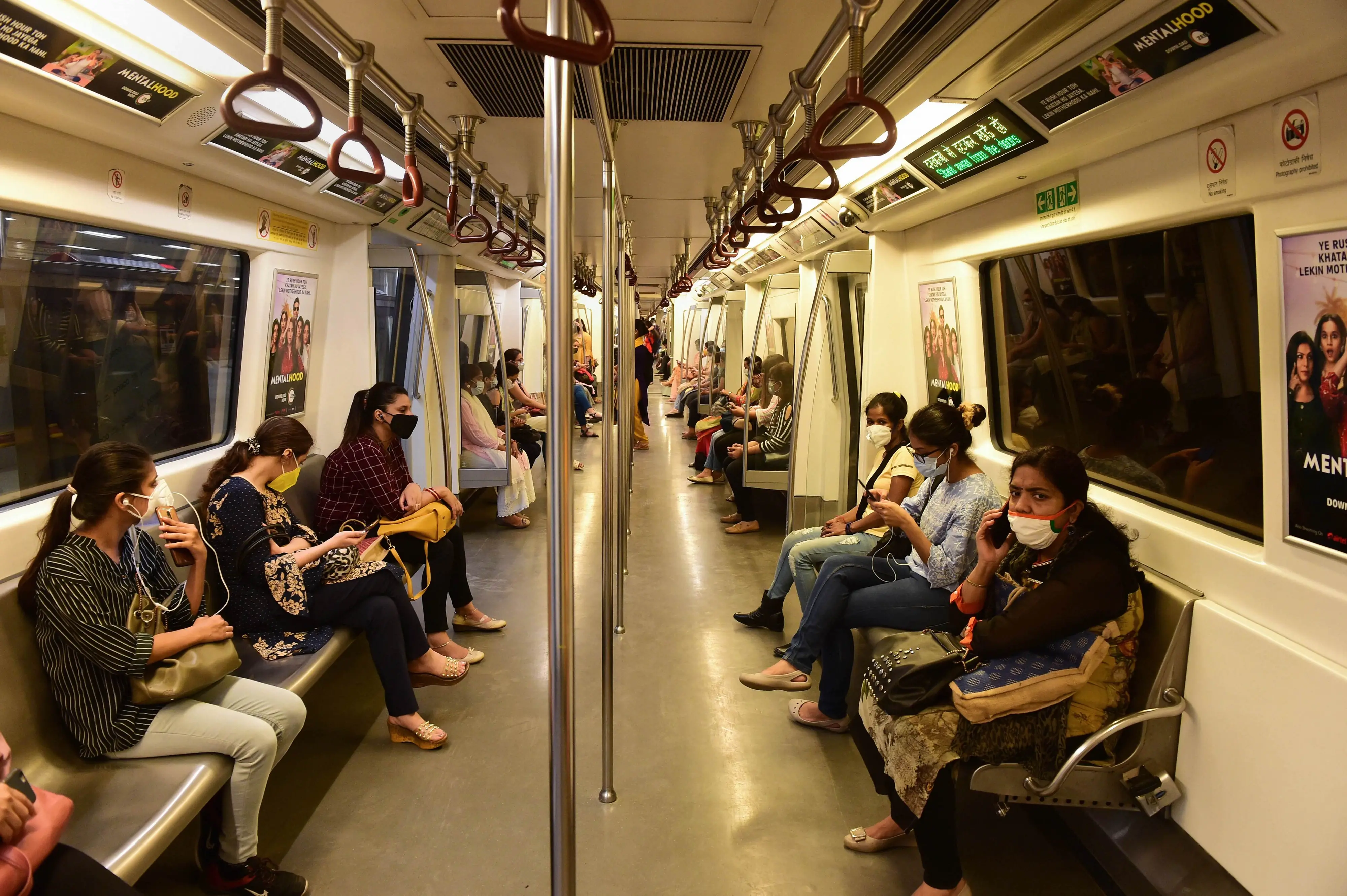 Passengers travel in a metro train in Delhi - representative image | Photo: PTI