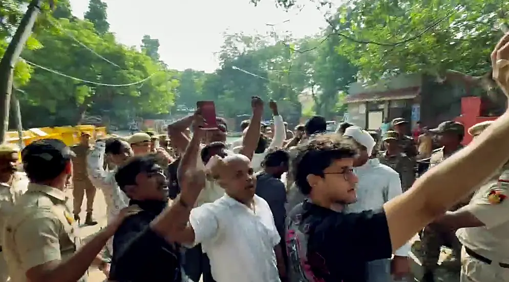 Cockroach Janta Party (CJP) Chief Spokesperson Saurav Das and its National Spokesperson Ashutosh Ranka (unseen) arrive at Jantar Mantar