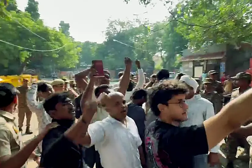 Cockroach Janta Party (CJP) Chief Spokesperson Saurav Das and its National Spokesperson Ashutosh Ranka (unseen) arrive at Jantar Mantar