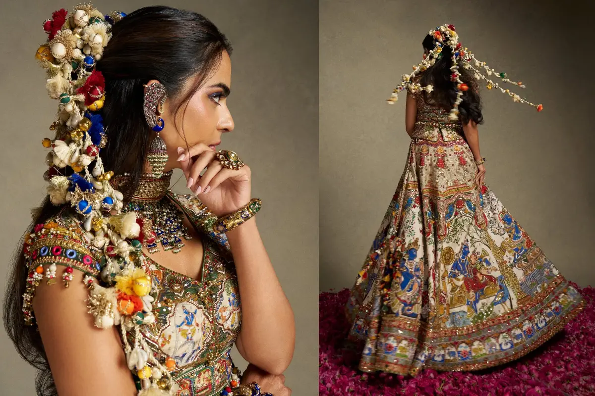 Isha Ambani wears a custom Torani lehenga featuring intricate kalamkari and pattachitra-inspired artwork for Swadesh's first anniversary. Photos | Instatgram/@torani