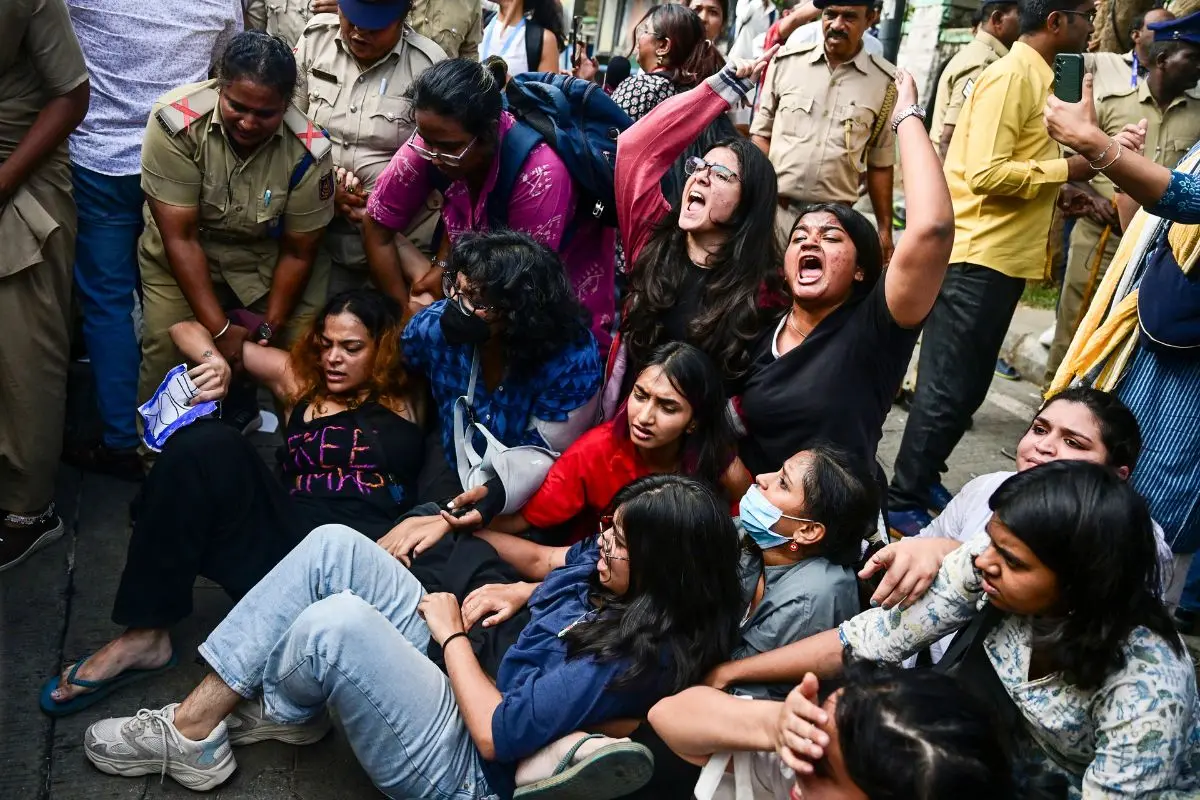 Police personnel detains Cockroach Janta Party (CJP) supporters during a protest against Chief Election Commissioner (CEC) Gyanesh Kumar over the alleged irregularities in the Special Intensive Revision (SIR) of electoral rolls, at Freedom park, in Bengaluru, Karnataka, Monday, Oct. 12, 2026 (Photo: PTI)