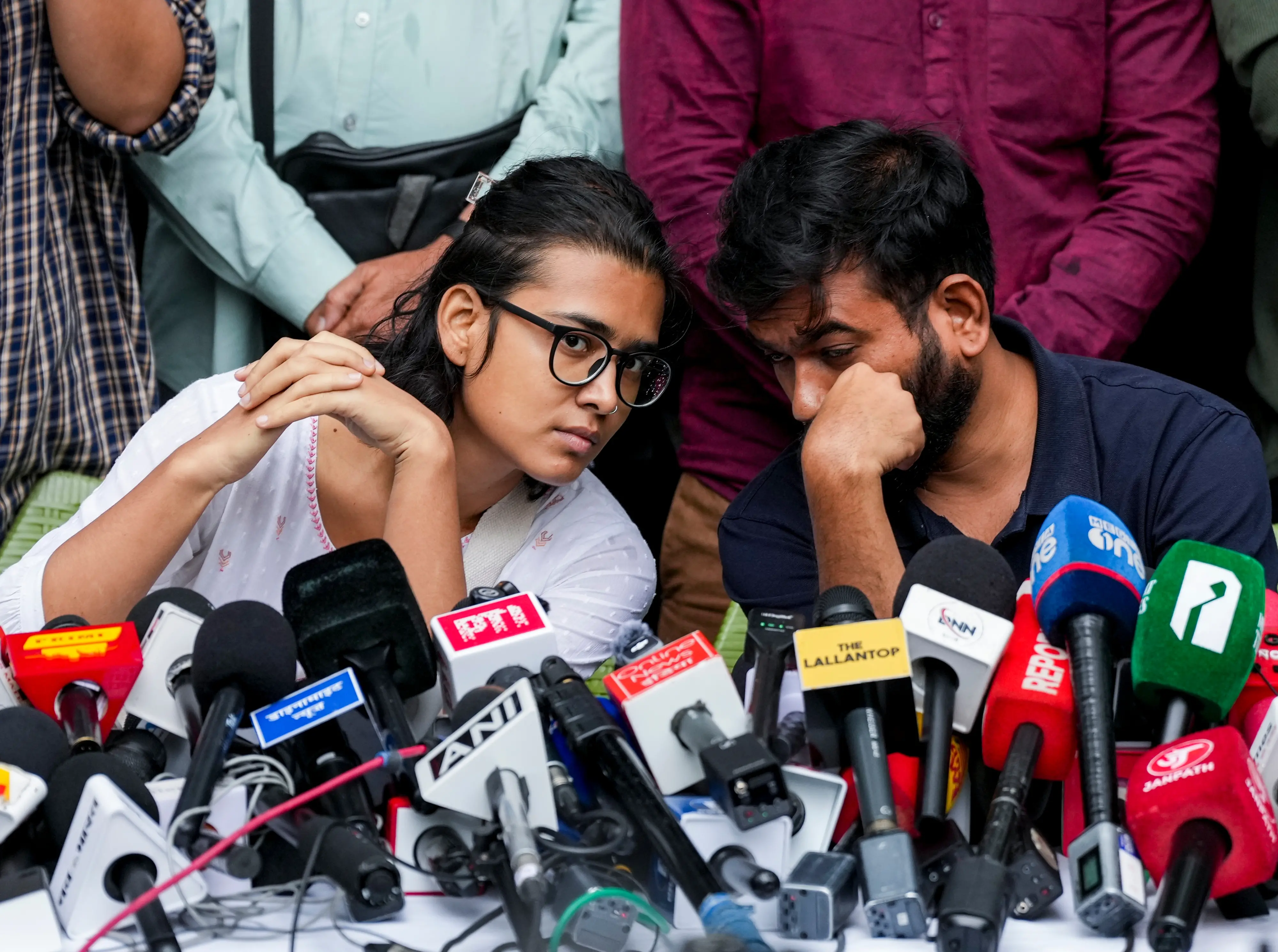 Cockroach Janta Party (CJP) founder Abhijeet Dipke and AISA President Neha Bora | PTI