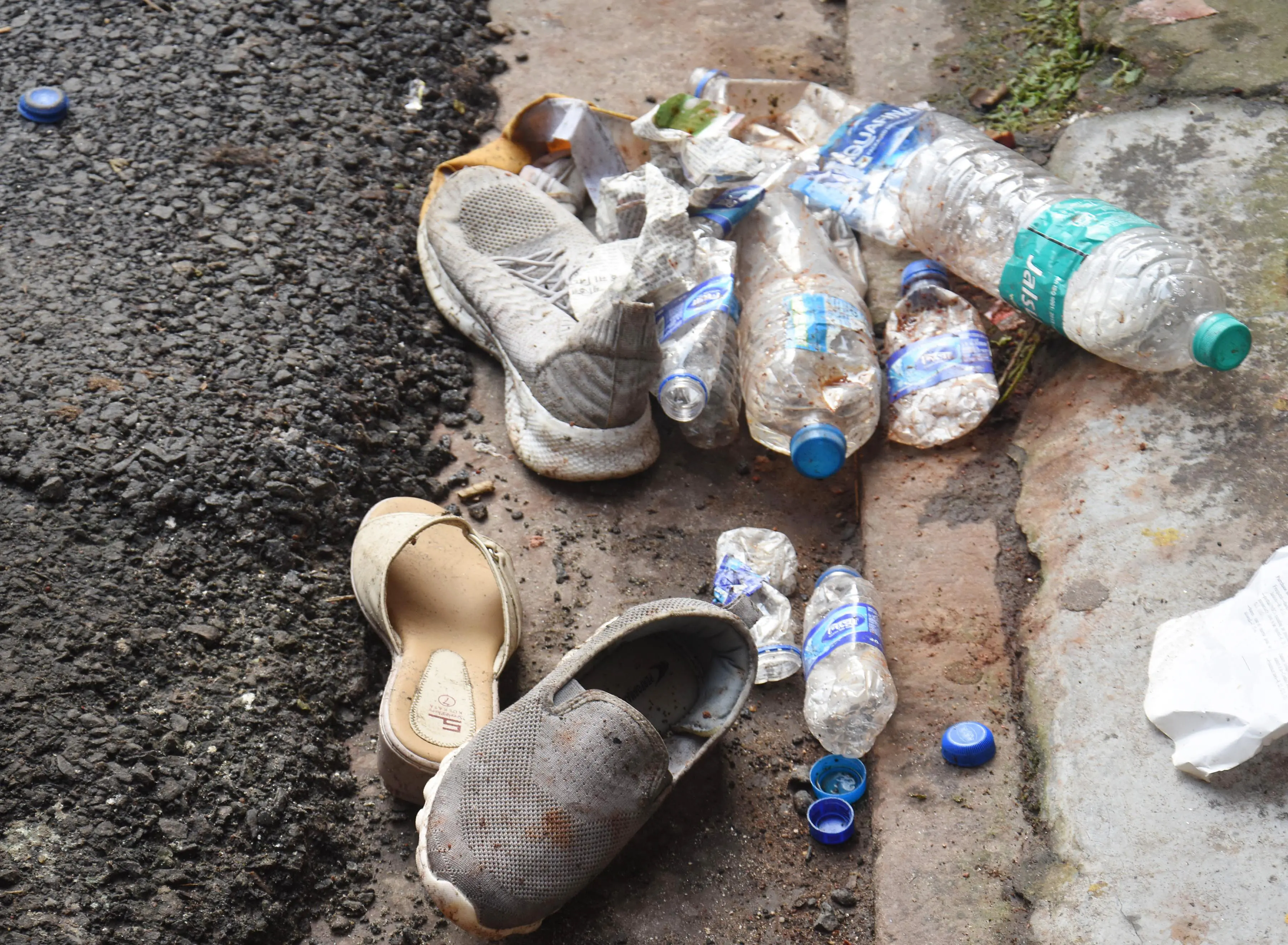 People's belongings left at the Chorbagan Durga Puja pandal site following the stampede incident in Kolkata